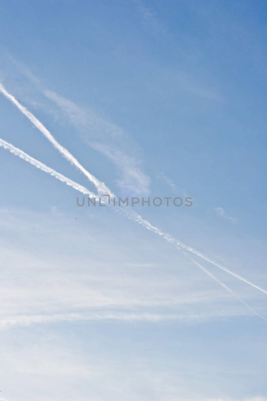 blue sky with traces of planes by vlaru