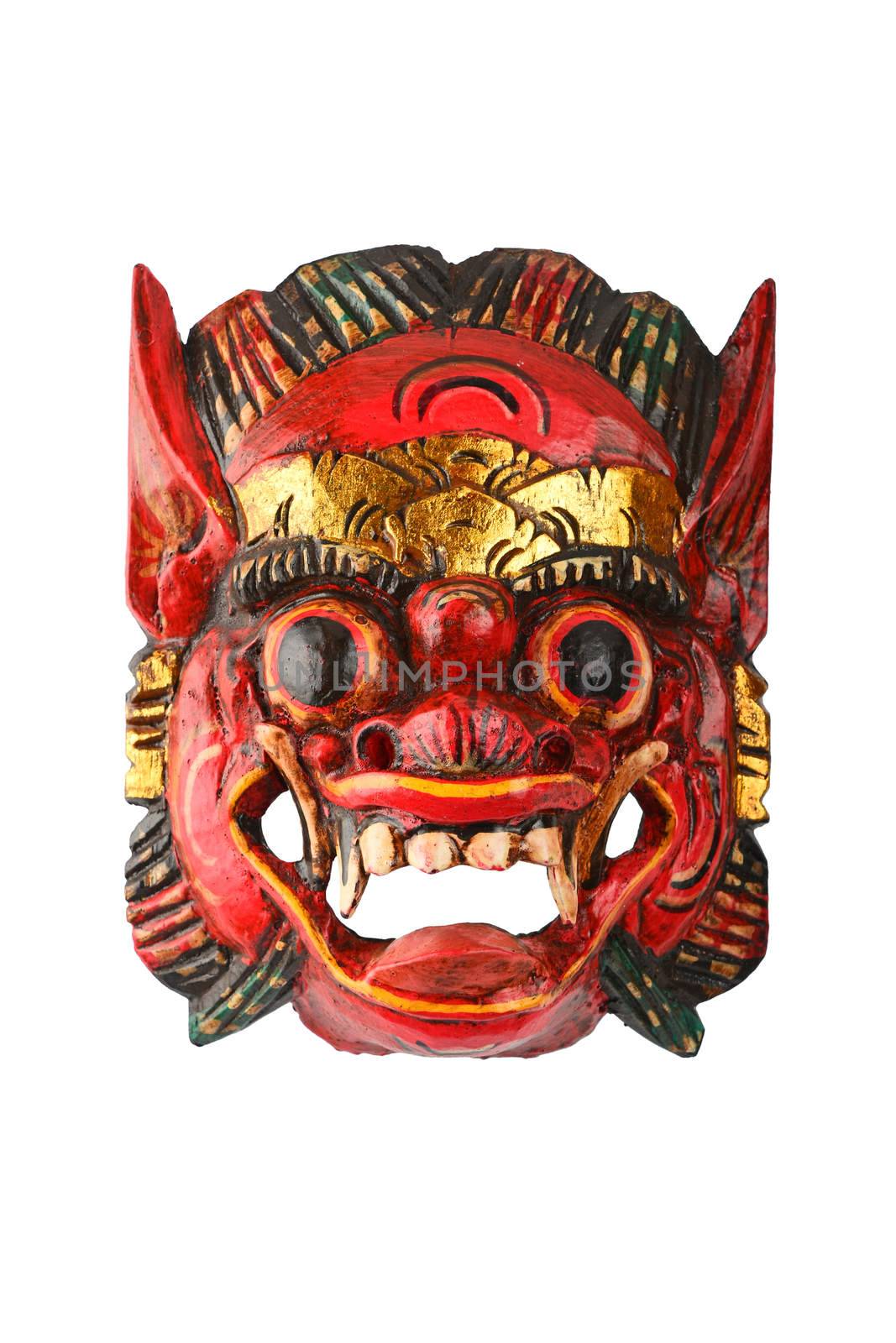 Asian traditional wooden carved painted red mask with face of human or demon isolated on white background, full face