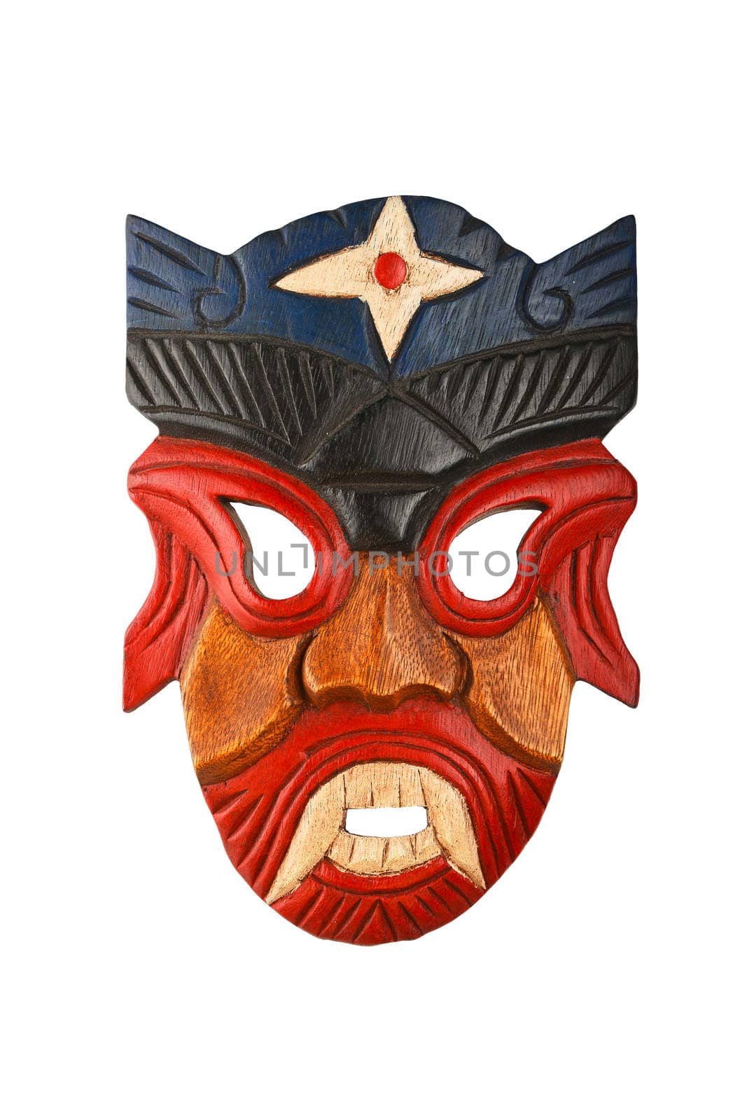 Asian traditional wooden carved mask with face of human or demon painted with vivid red and blue isolated on white background