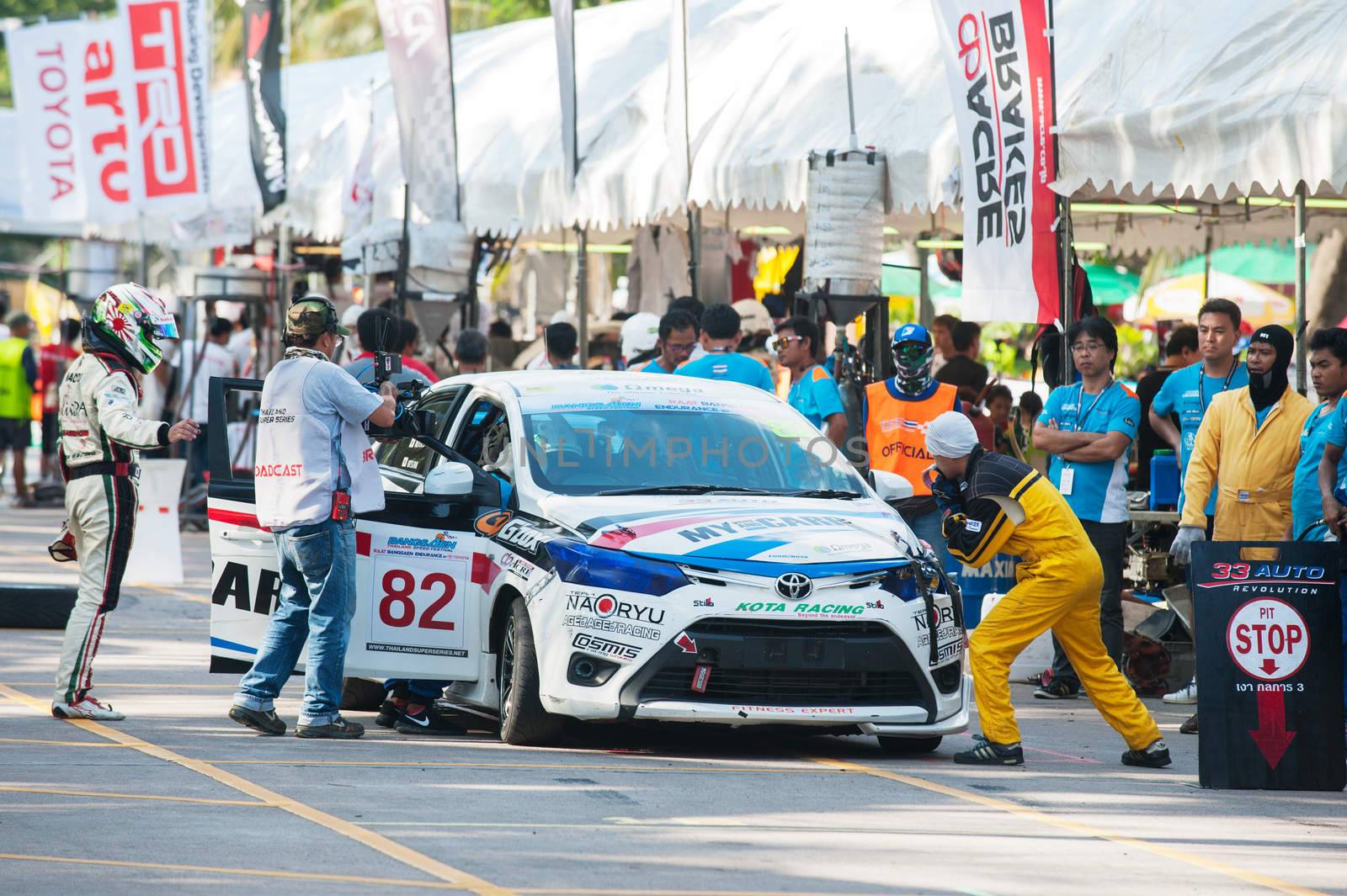 Bang Saen, Thailand - November 27, 2015: Pit stop and driver change for a team during the 6 hour race street race during Bang Saen Speed Festival at Bang Saen, Chonburi, Thailand.