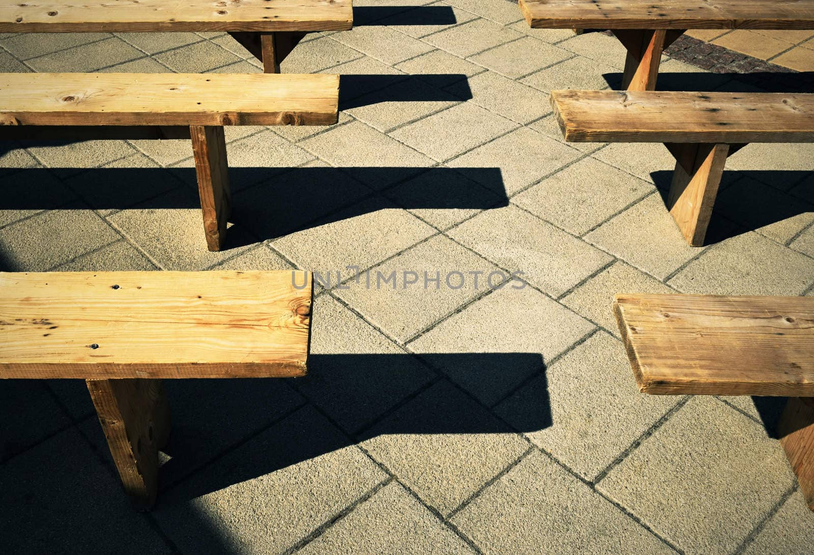 background retro wooden benches on the pavement