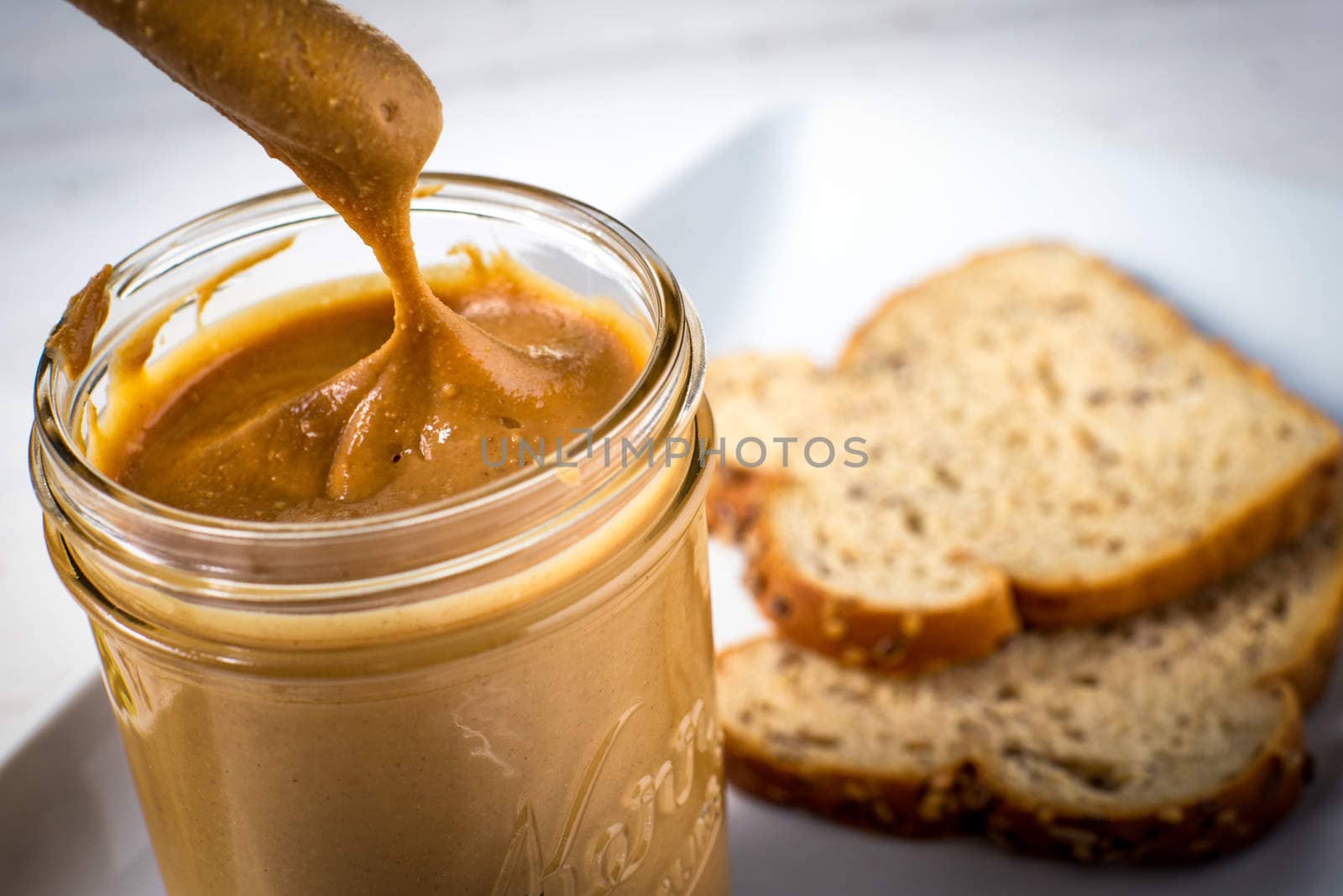 Freshly made peanut butter spread fat