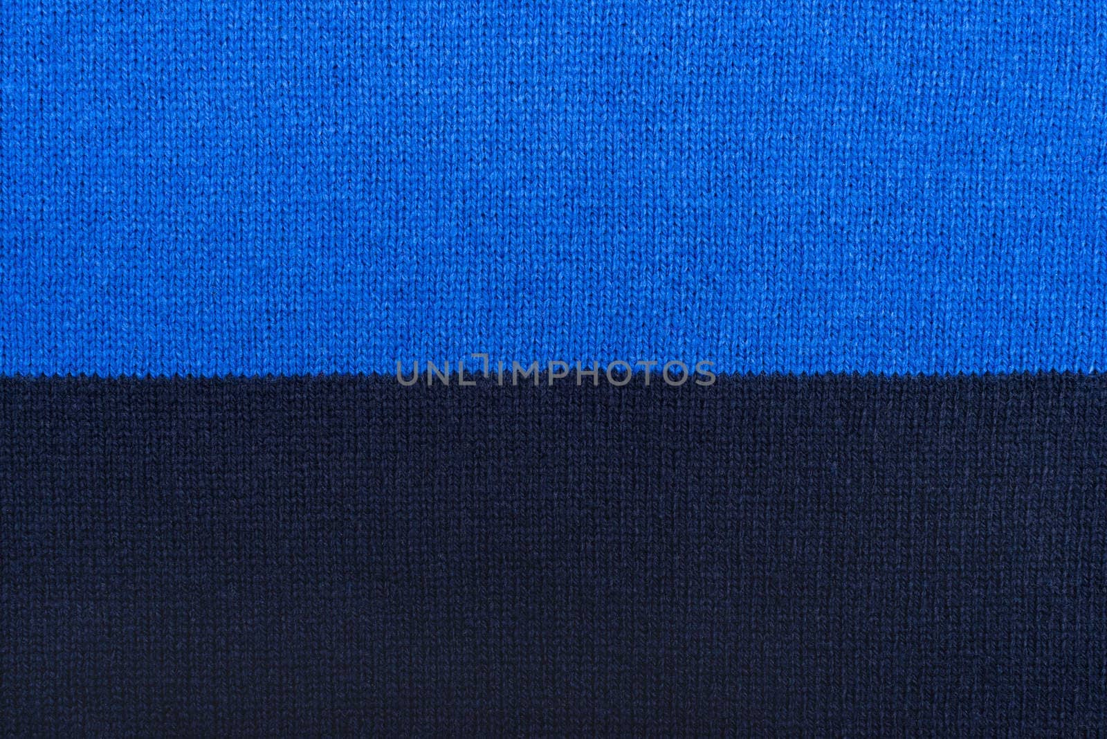 Knit woolen texture. Fabric blue background by DNKSTUDIO