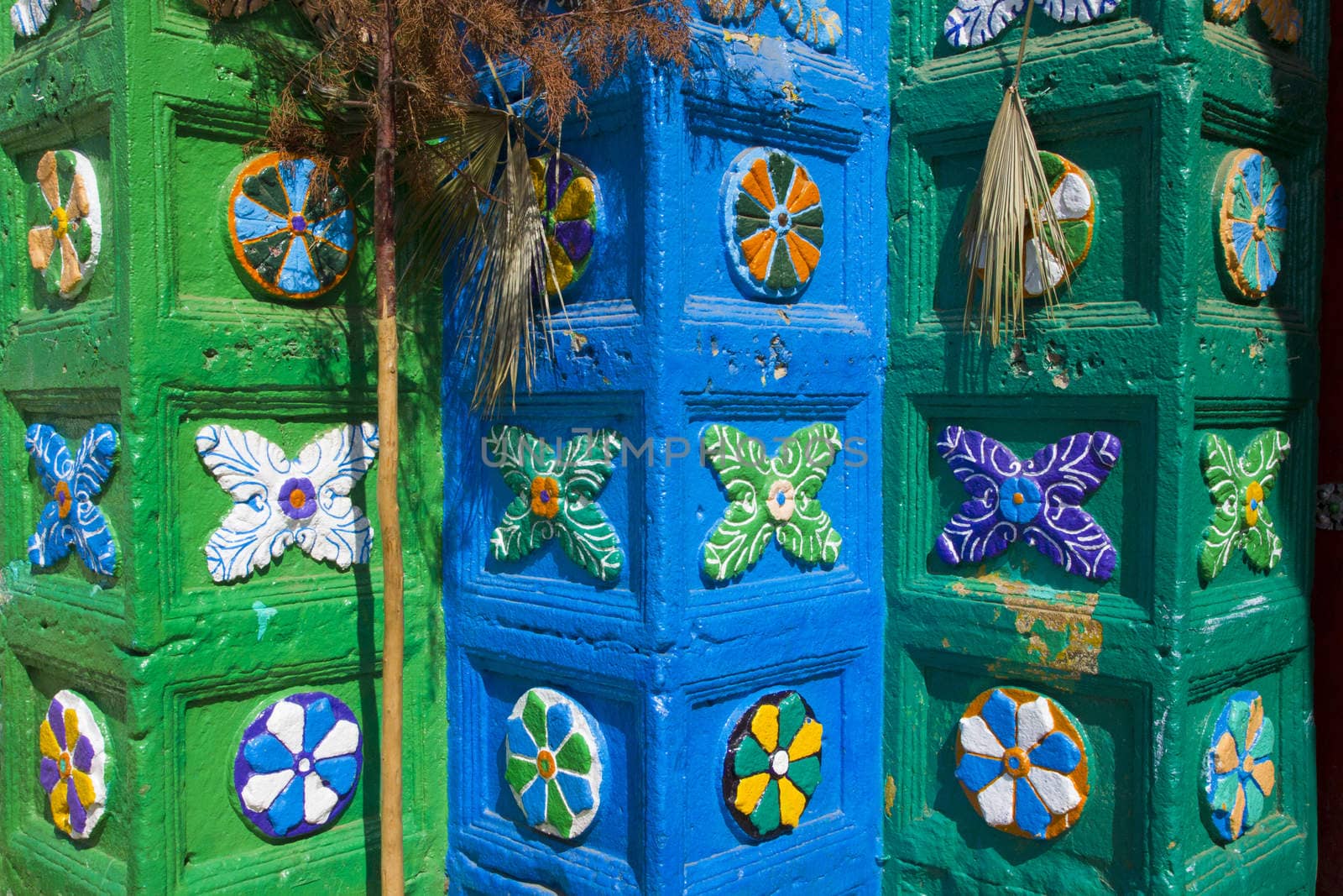 Panels on the facade of a church that practises the Mayan religion