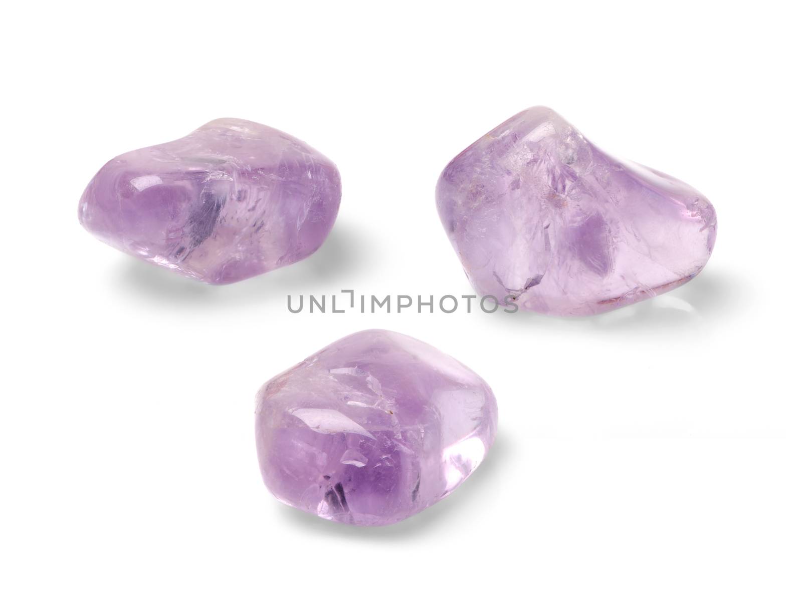 Amethyst shot from three angles isolated on white background.