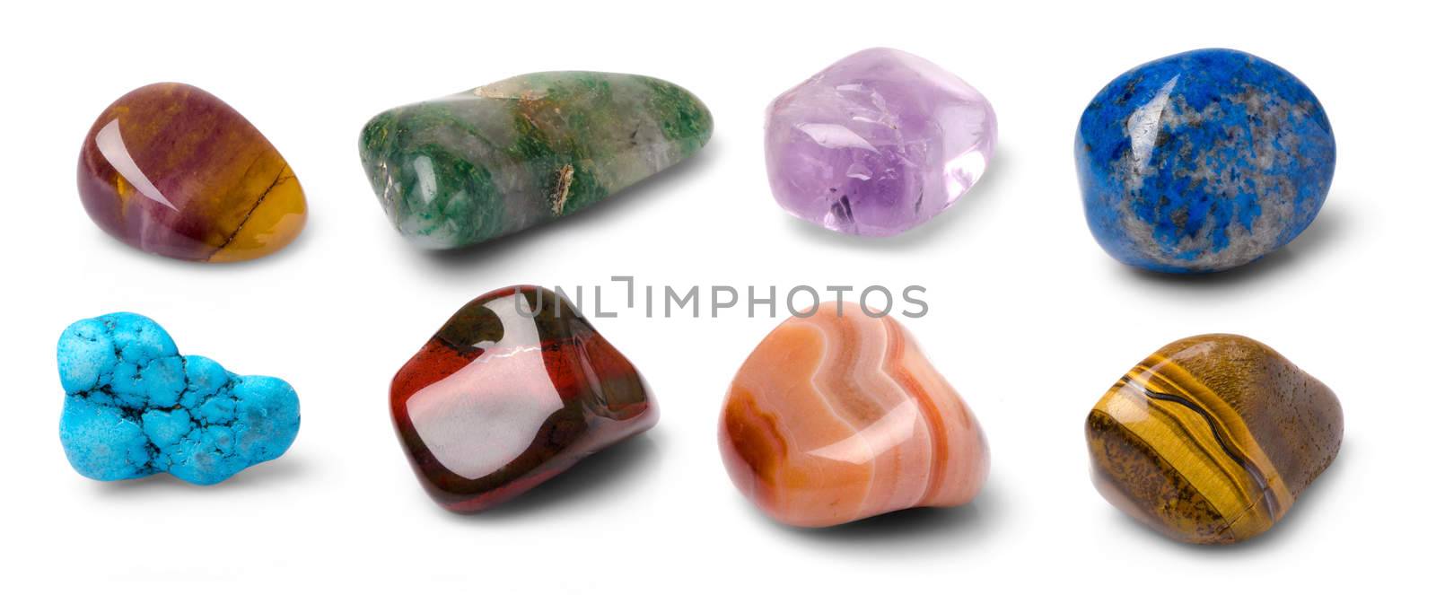 Eight colorful gems isolated on white background.