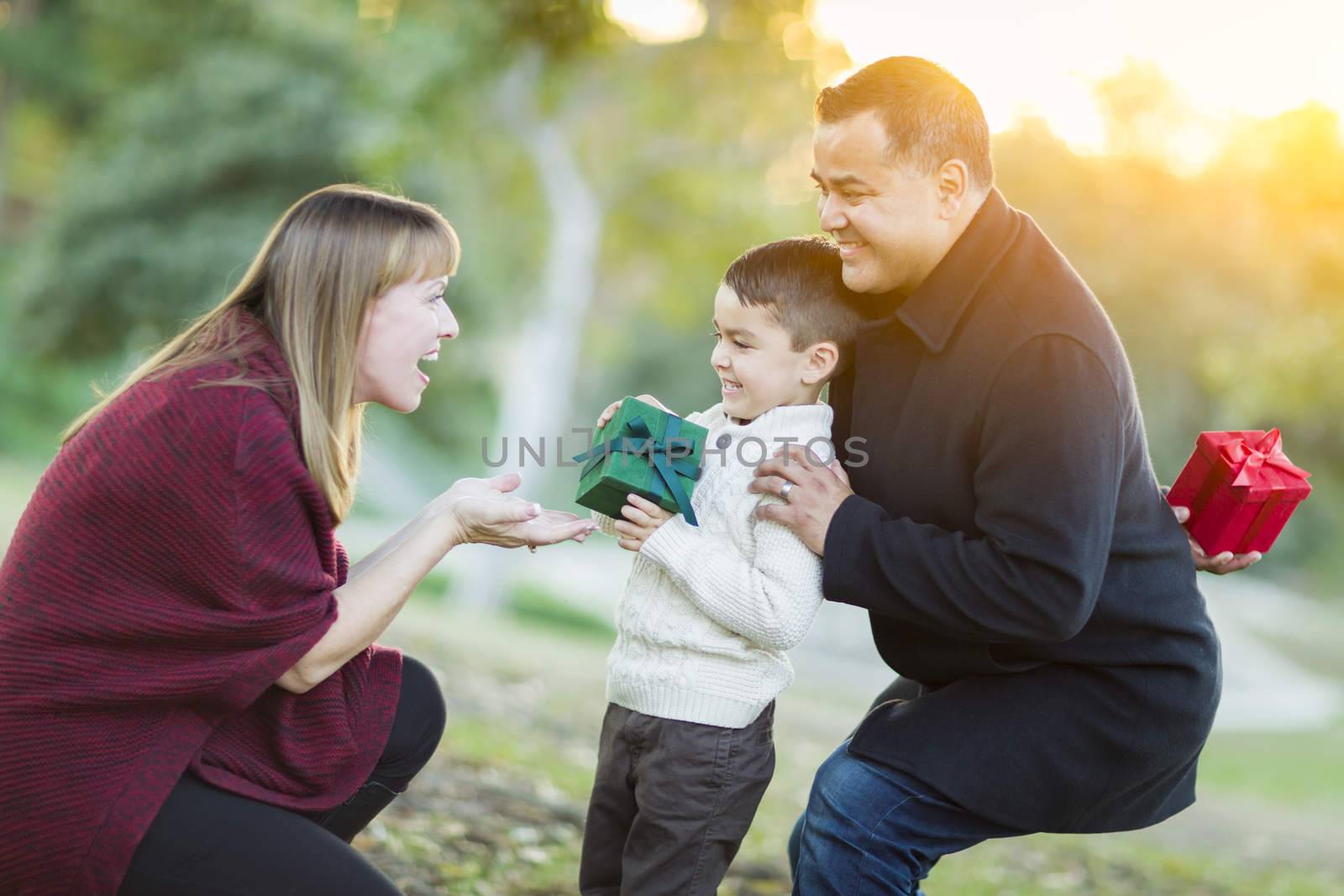 Young Mixed Race Son Handing Gift to His Mom by Feverpitched