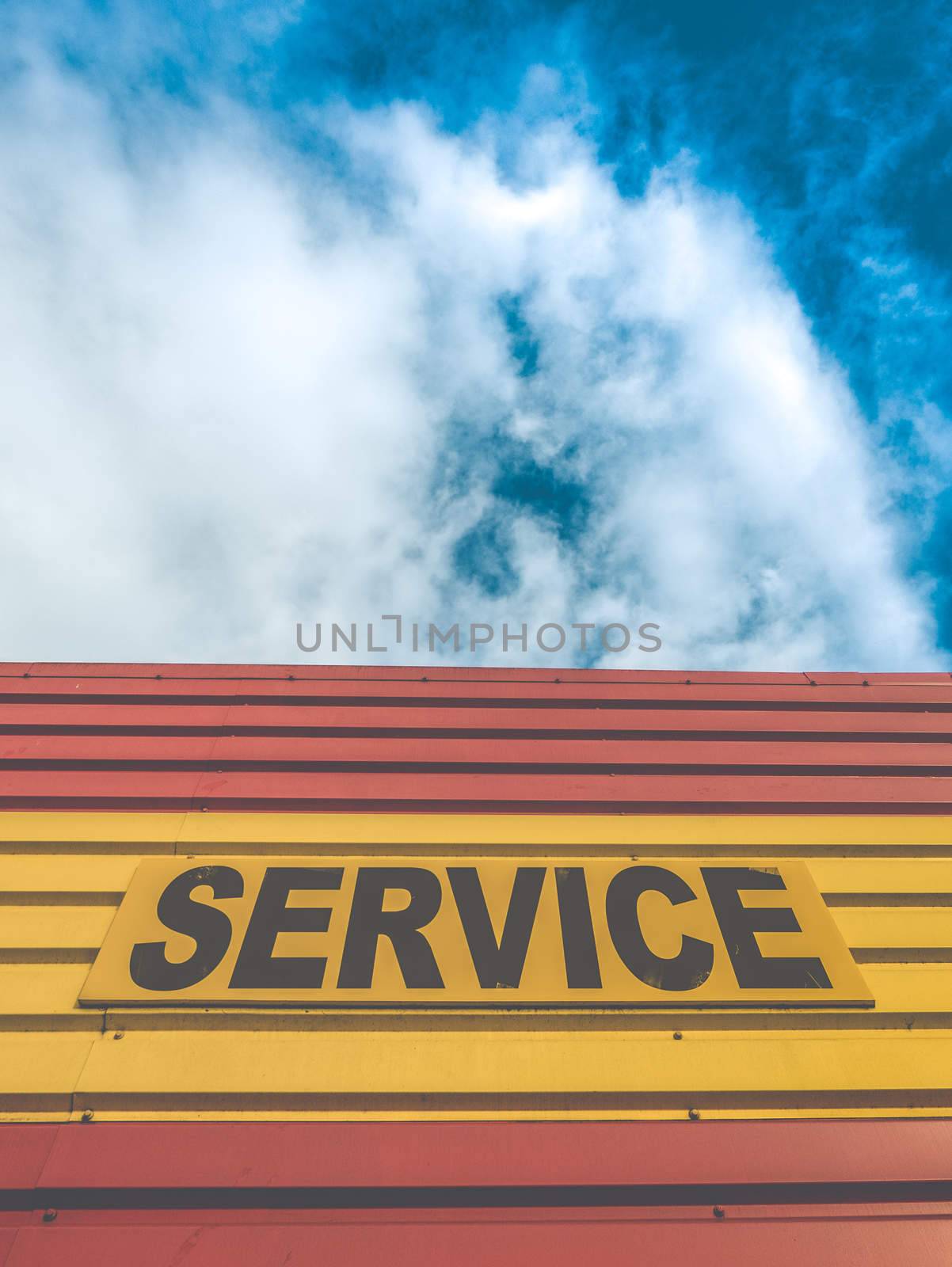 Retro Style Auto Repair Shop Or Garage With Service Sign