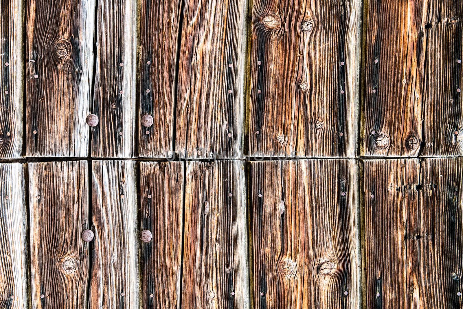 Texture formed by the wooden wall of an old barn.