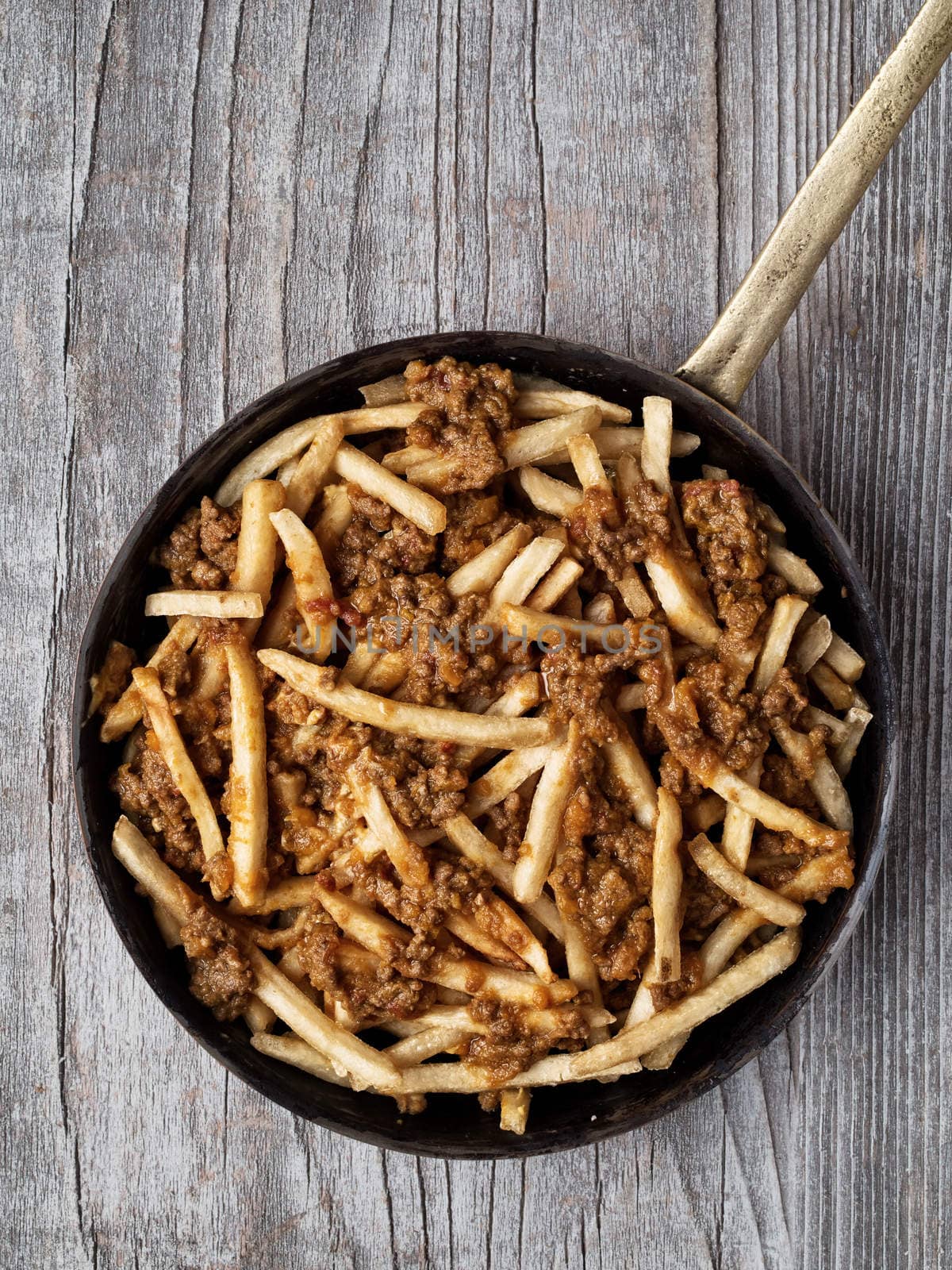 close up of rustic american chili fries