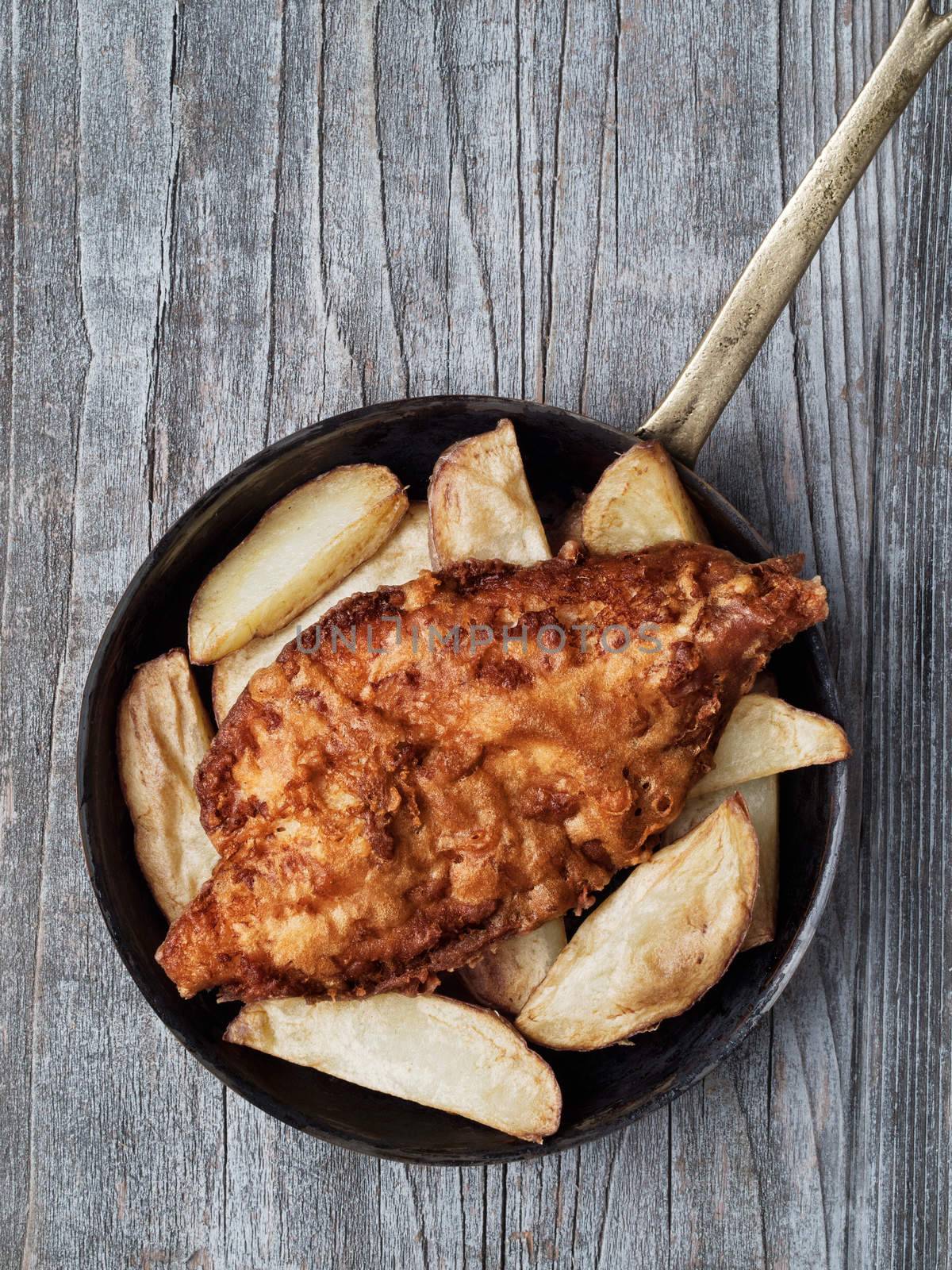 close up of rustic traditional english fish and chips