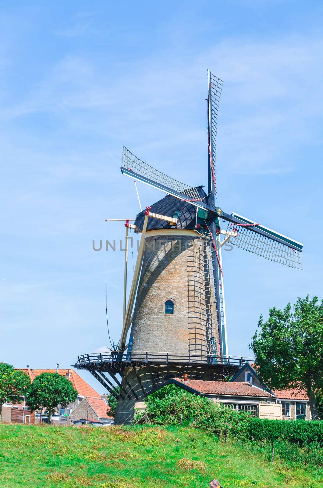 Traditional historic Dutch windmill in Zierikze in the Netherlands.