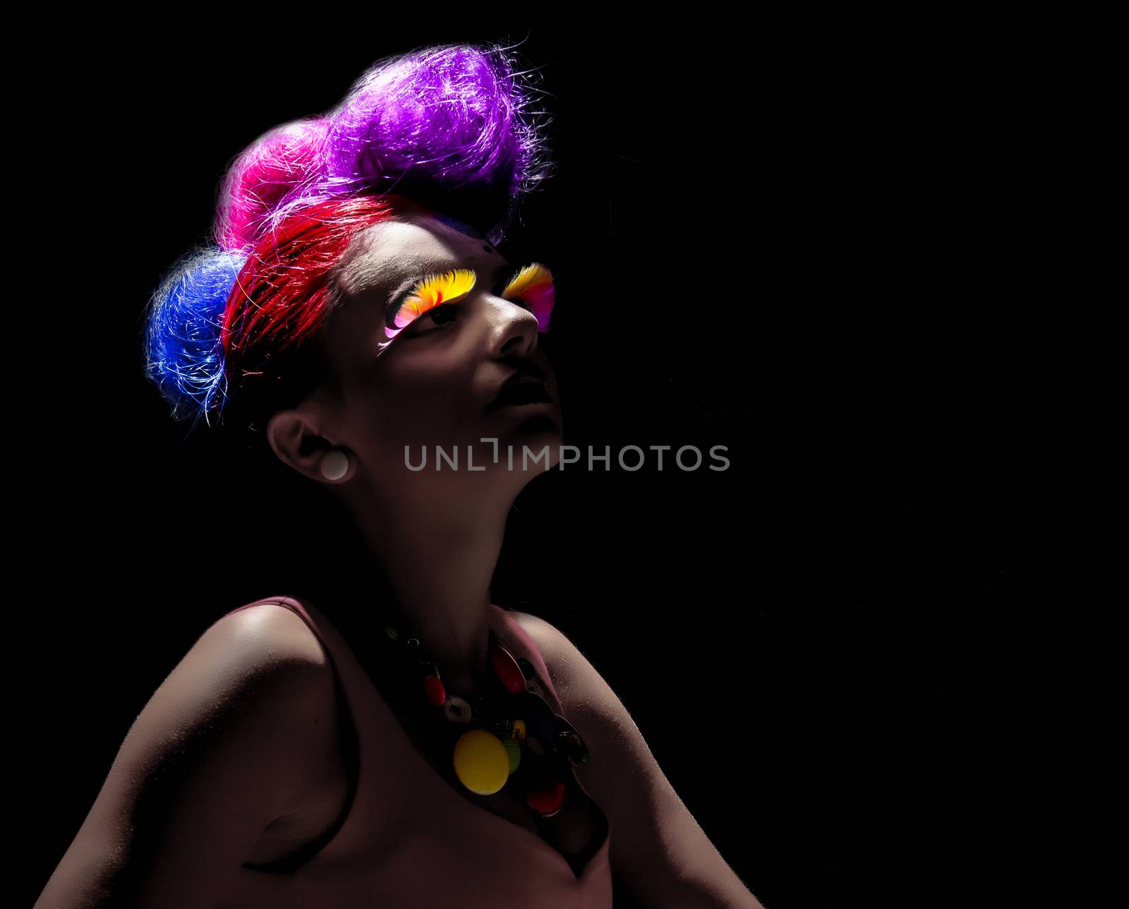 Female model posing with distinctive hairstyle