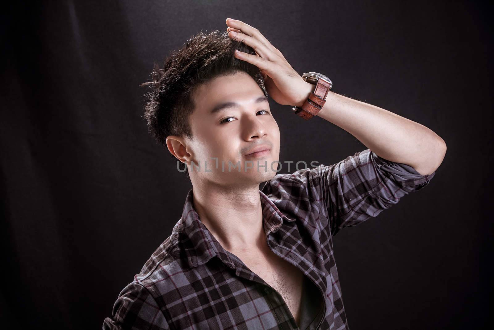 Portrait of Asian young man by imagincy