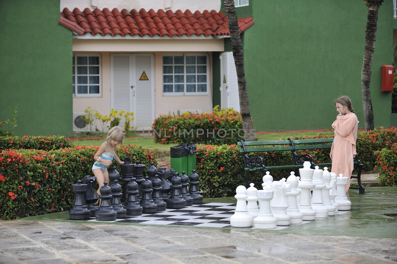 Girls playing big chess. by kertis