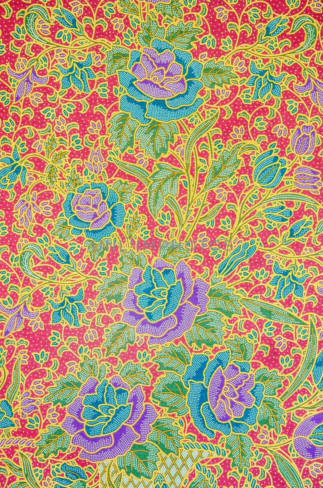 Colorful batik cloth fabric background by Gamjai