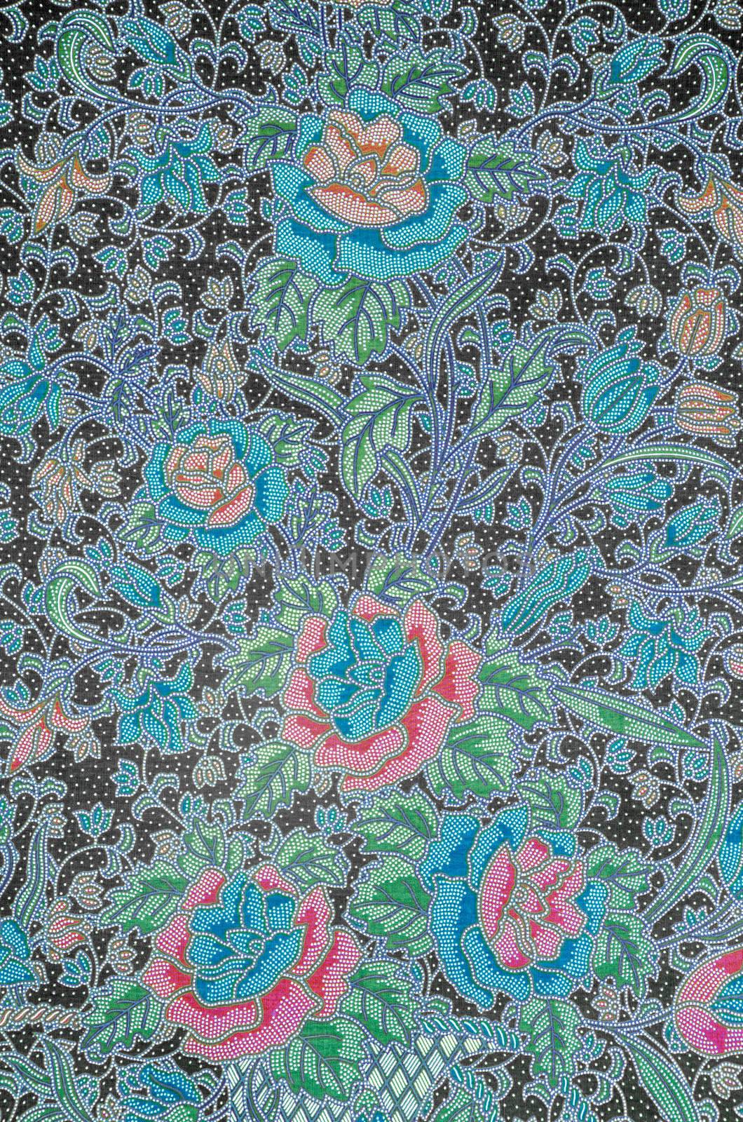 Colorful batik cloth fabric background by Gamjai