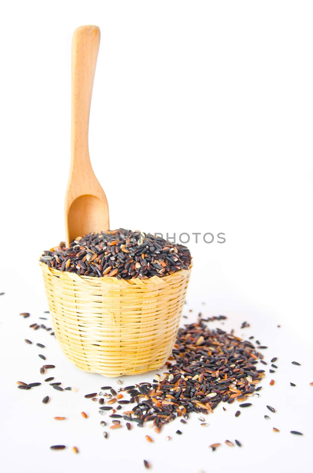 Thai black jasmine rice (Rice berry) in weave basket.