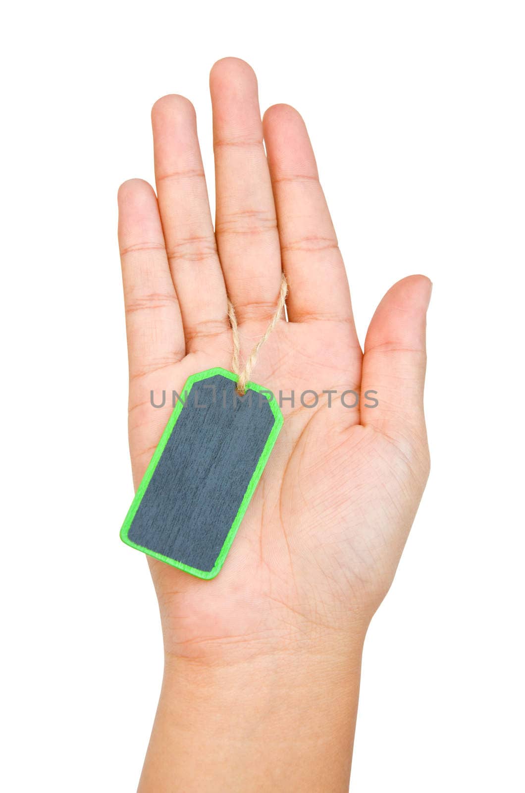 Wooden tag Label in a female hand isolated on white background. clipping path.