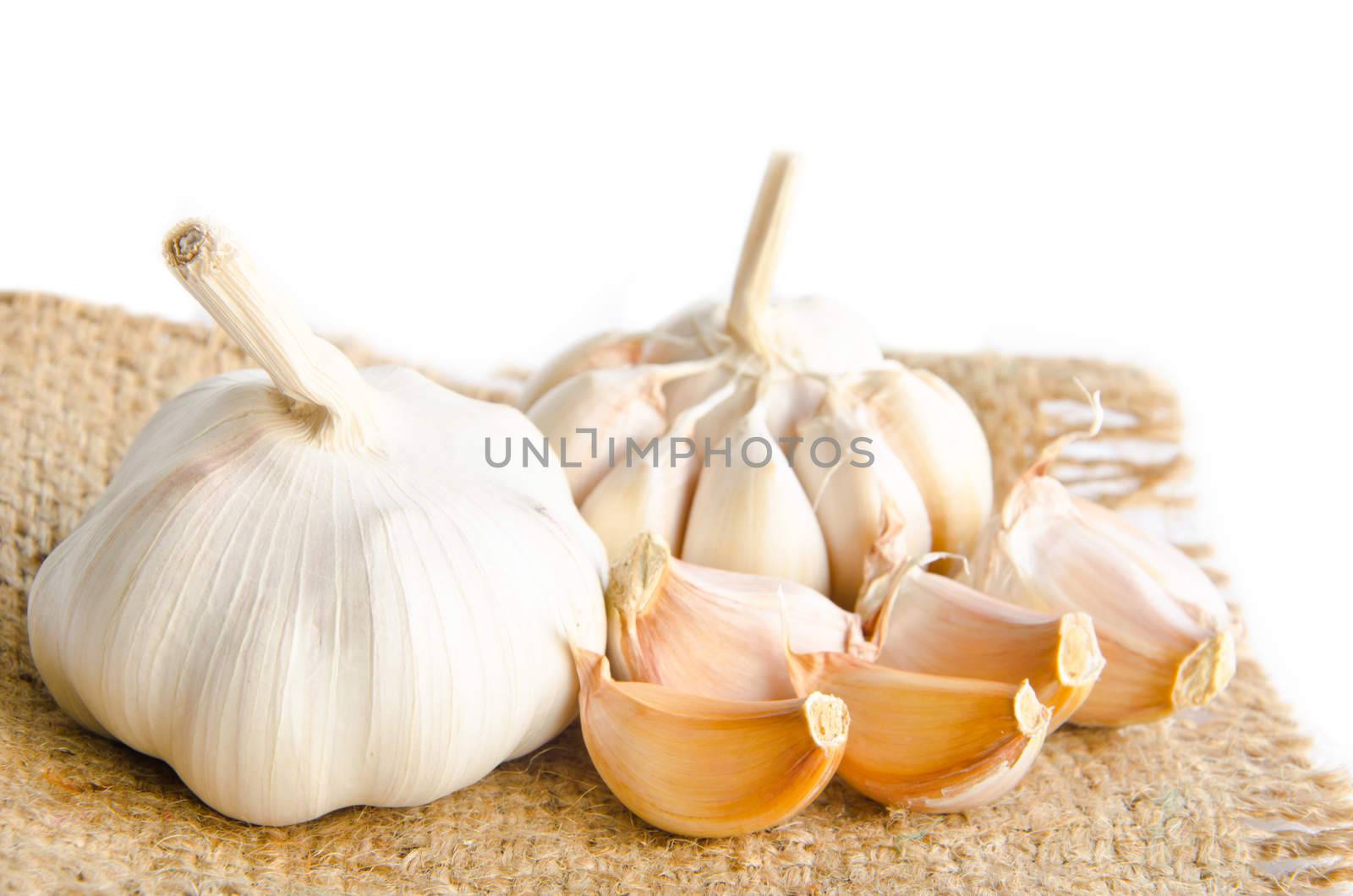 garlic on sack background