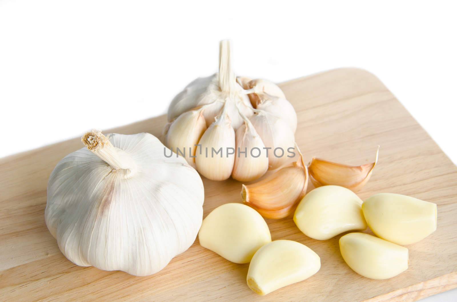 Garlic on wooden.