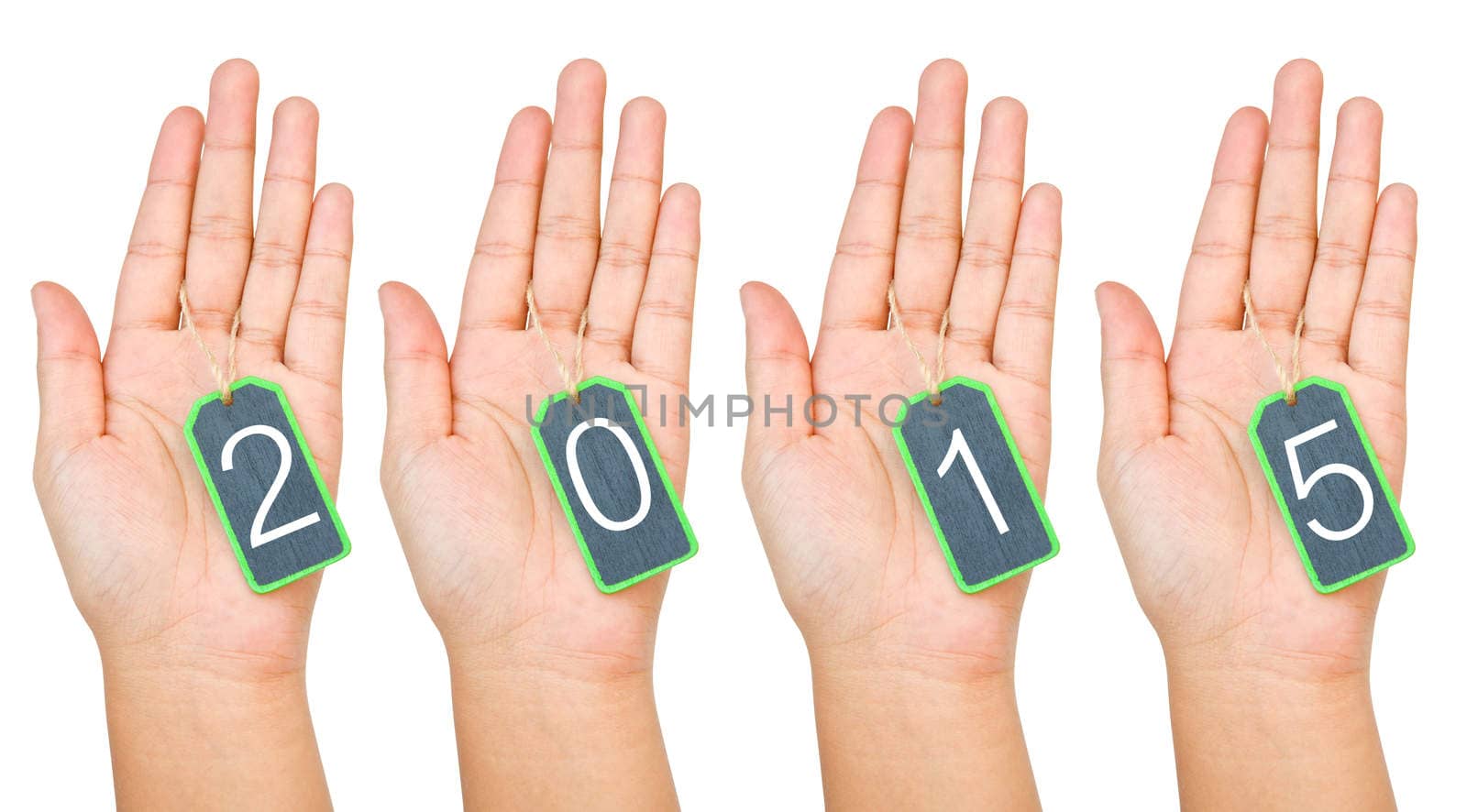 Hand holding blank 2015 wooden tag isolated on white background. clipping path.