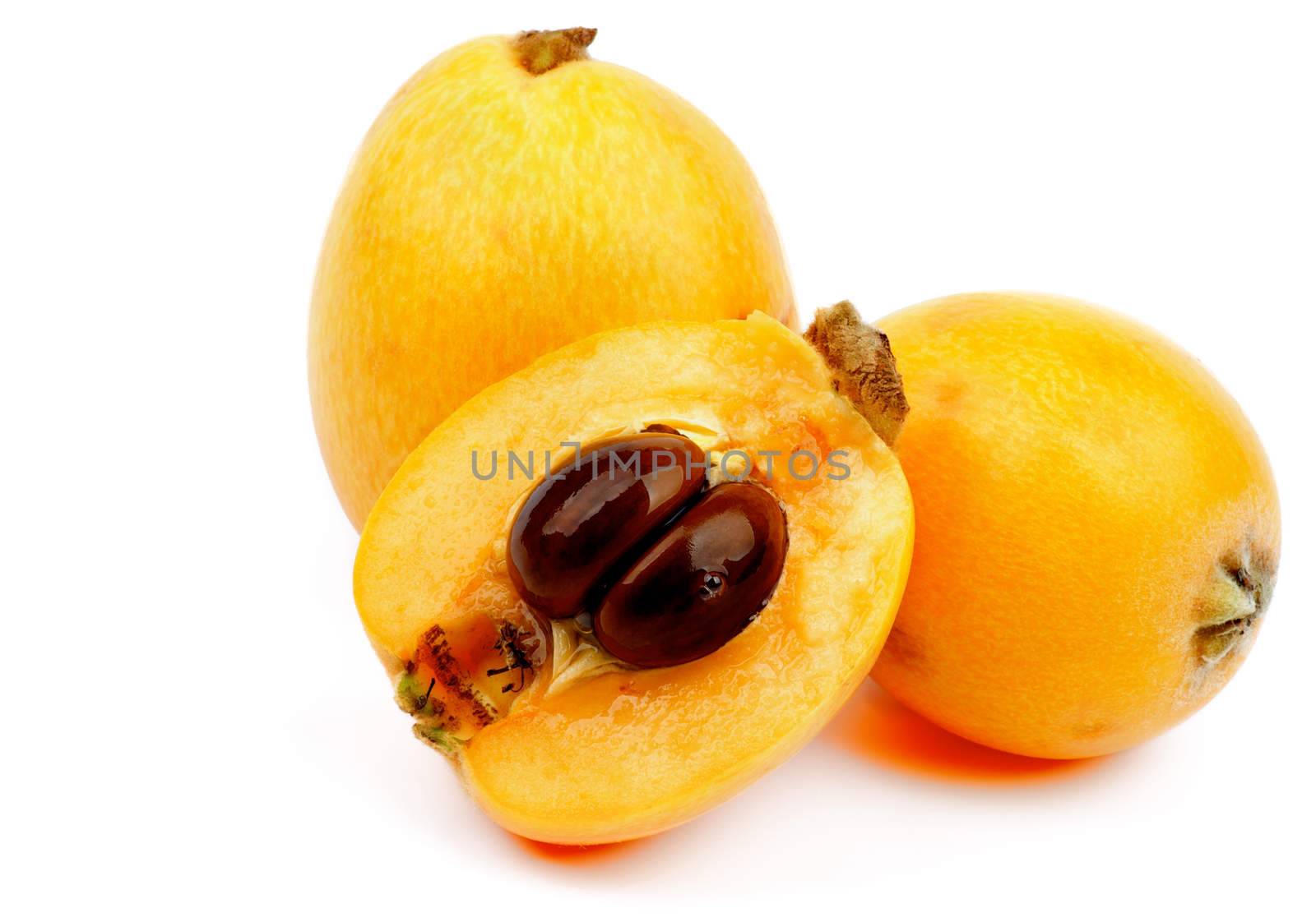 Arrangement of Loquat Medlar Fruit Full Body and One Half of isolated on White background