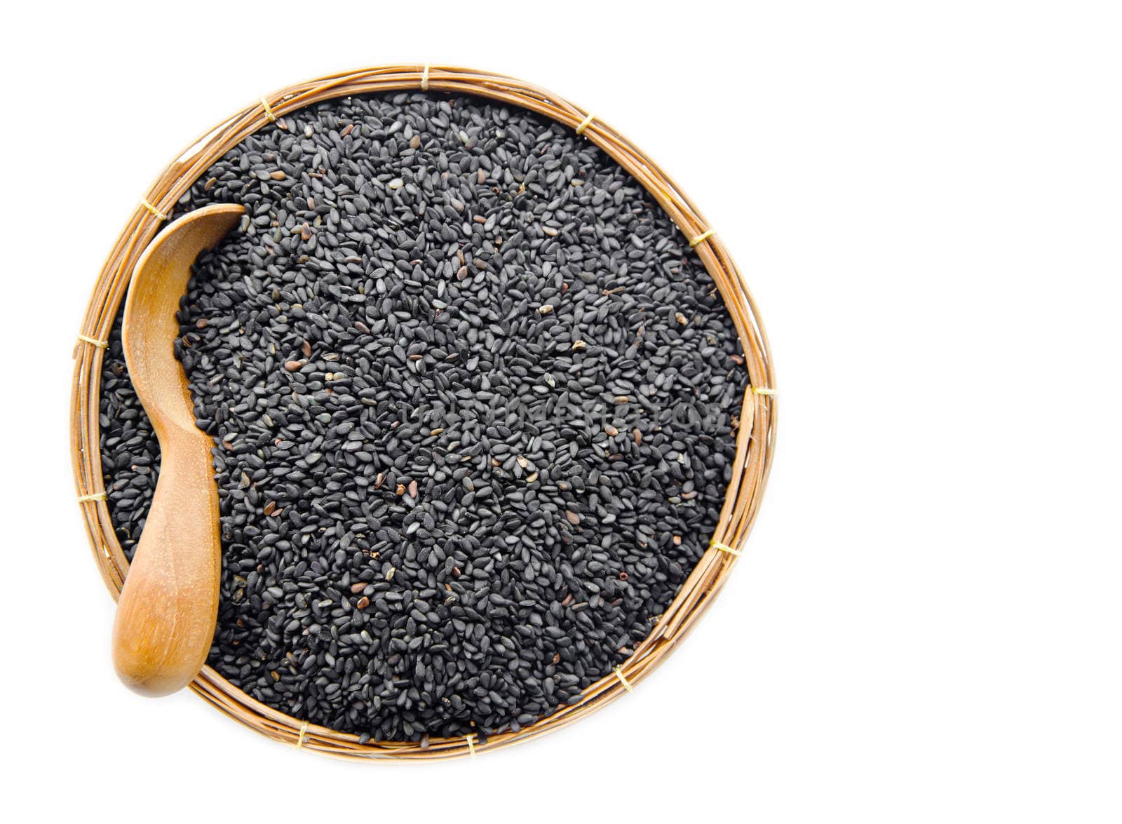poppy seeds in weave basket on white background.