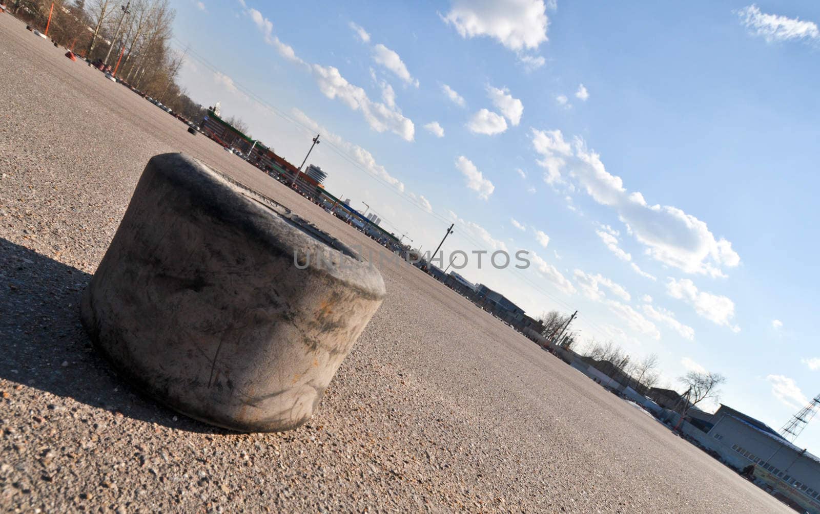 old karting tire on the asphalt of a race track