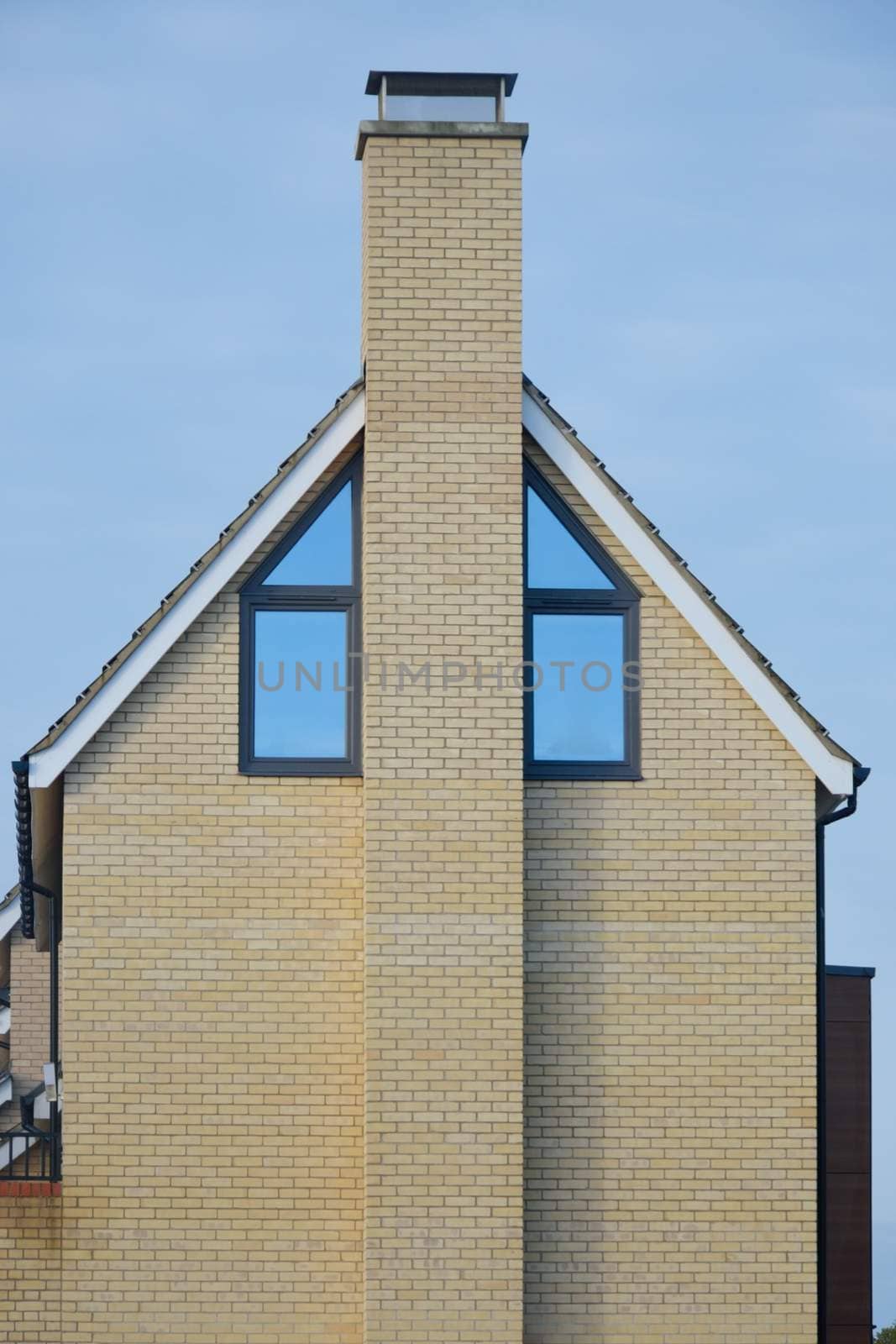 Side of Modern House and Chimney by pauws99