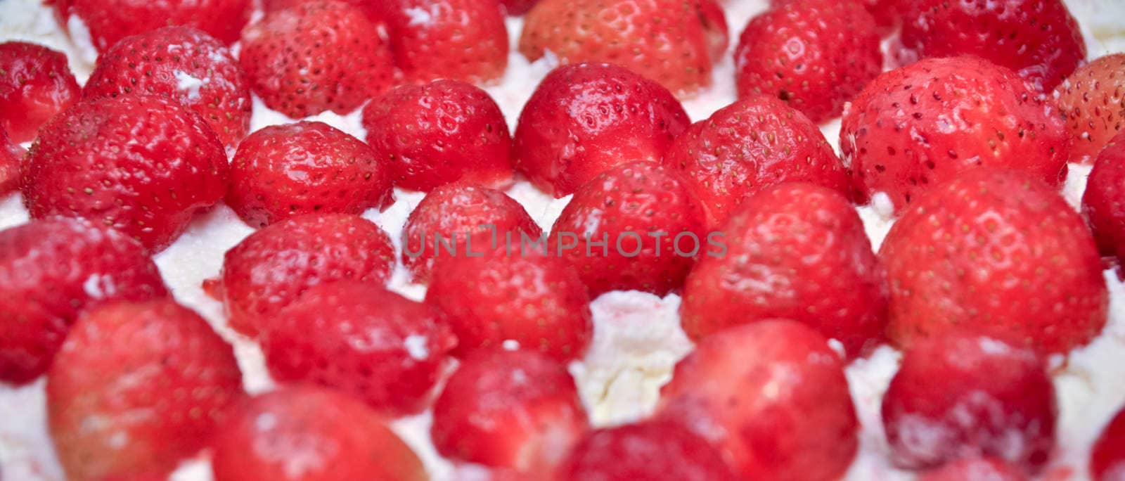 a dessert: a lot of strawberry in curd