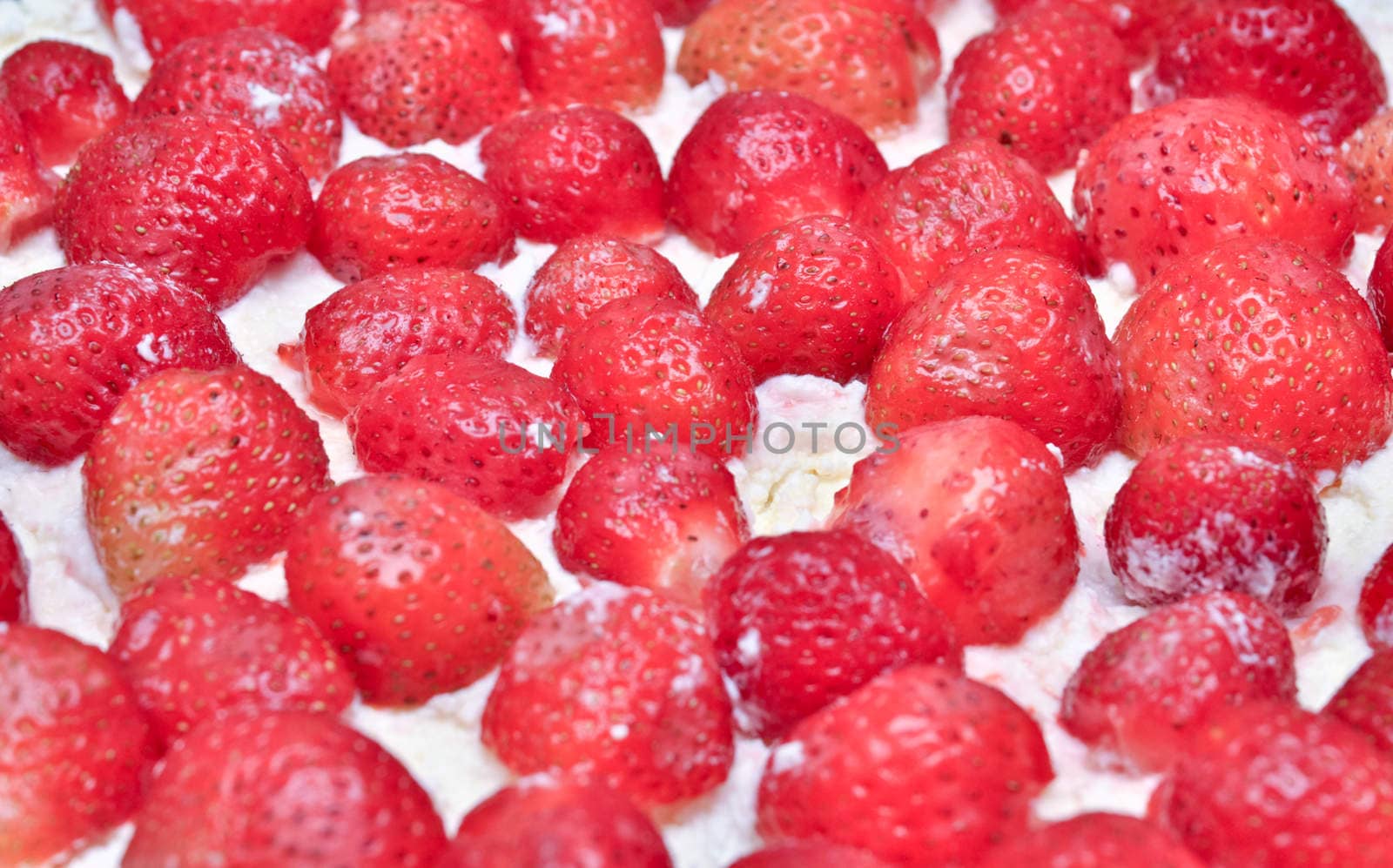 a dessert: a lot of strawberry in curd