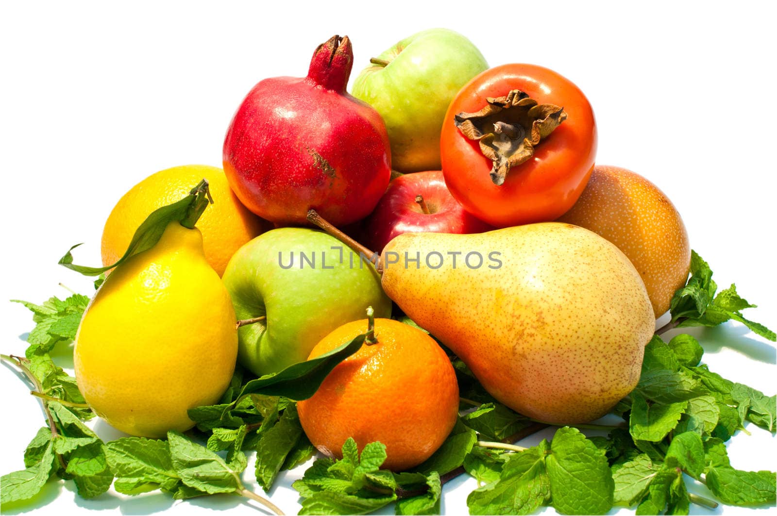 a lot of different fruits and green leaves on white background by vlaru