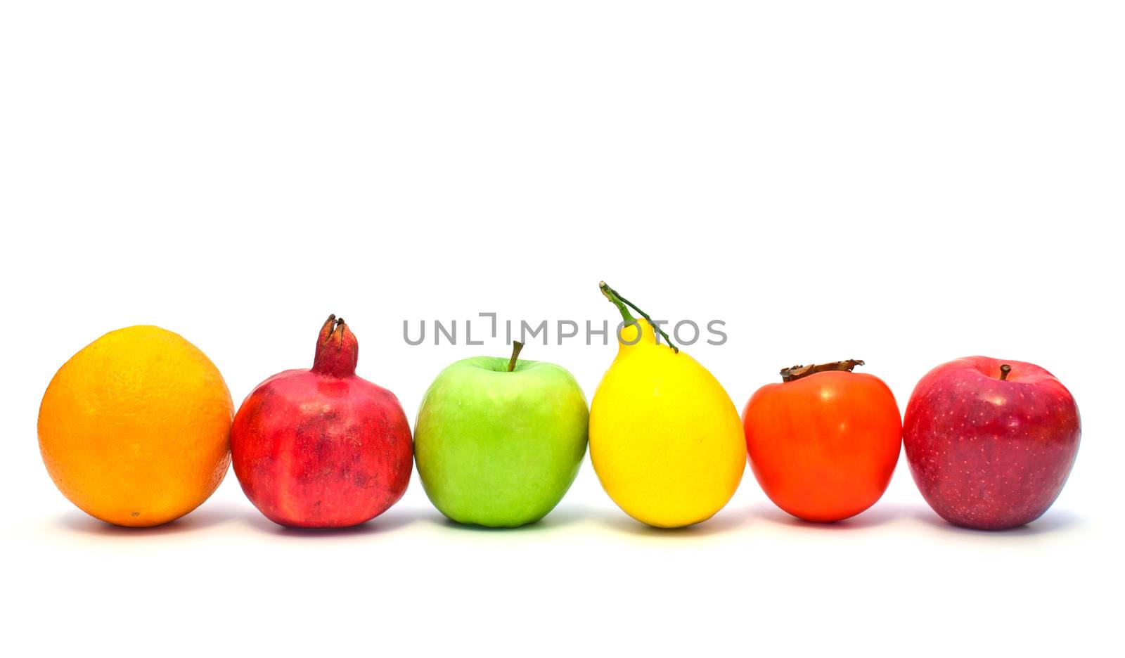 fruits in a row on a white background by vlaru