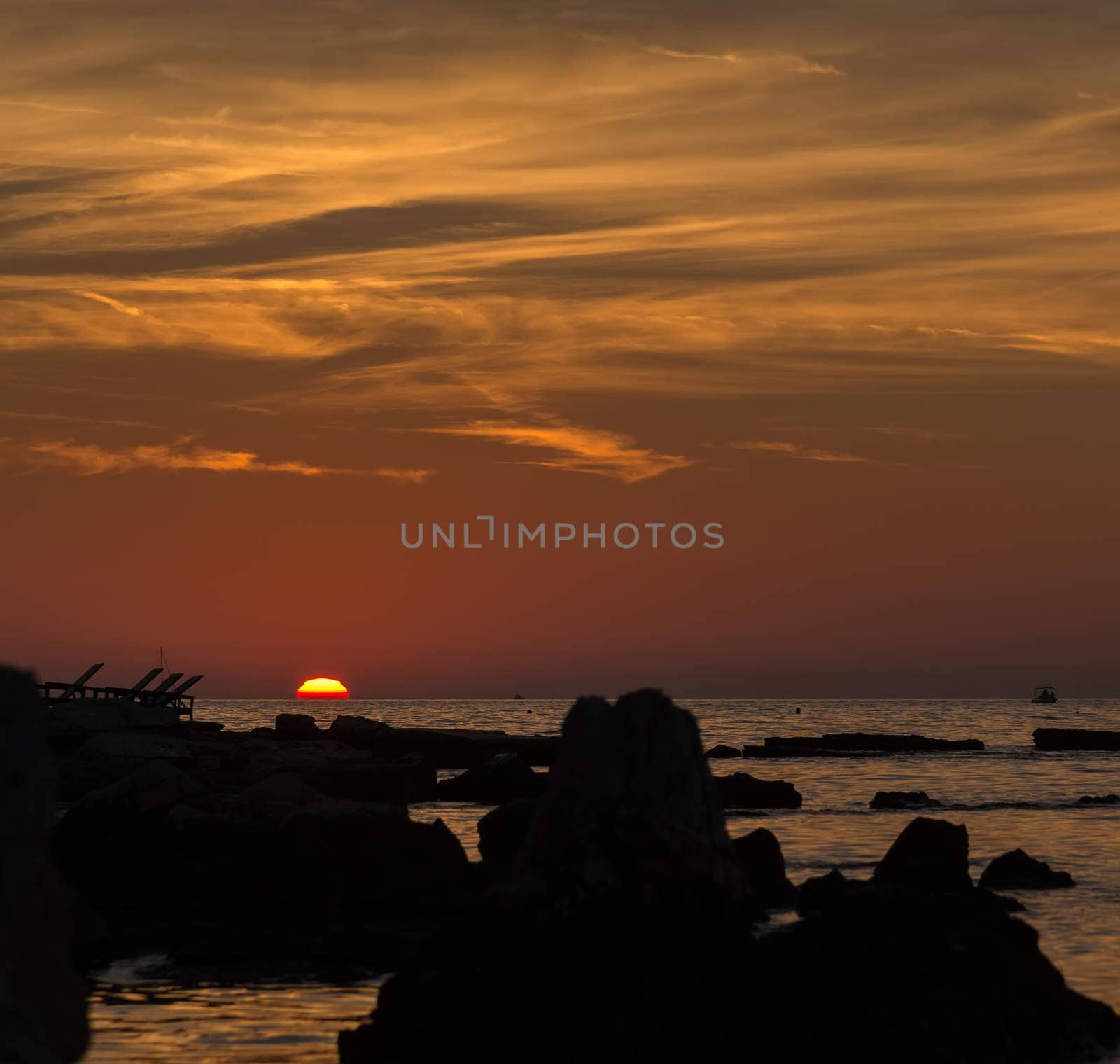 gorgeous sunset on the rocky coast of the Adriatic