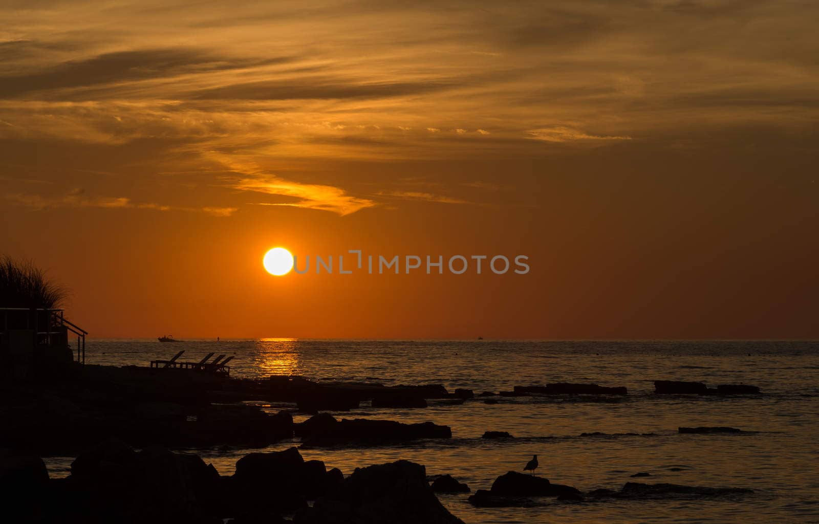 gorgeous sunset on the rocky coast of the Adriatic