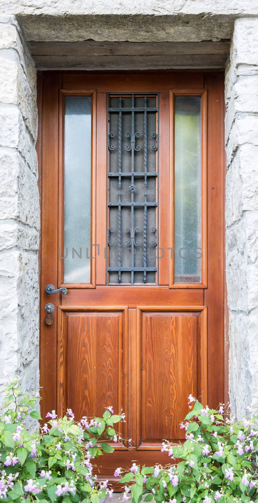 the single wing brown wood front door 