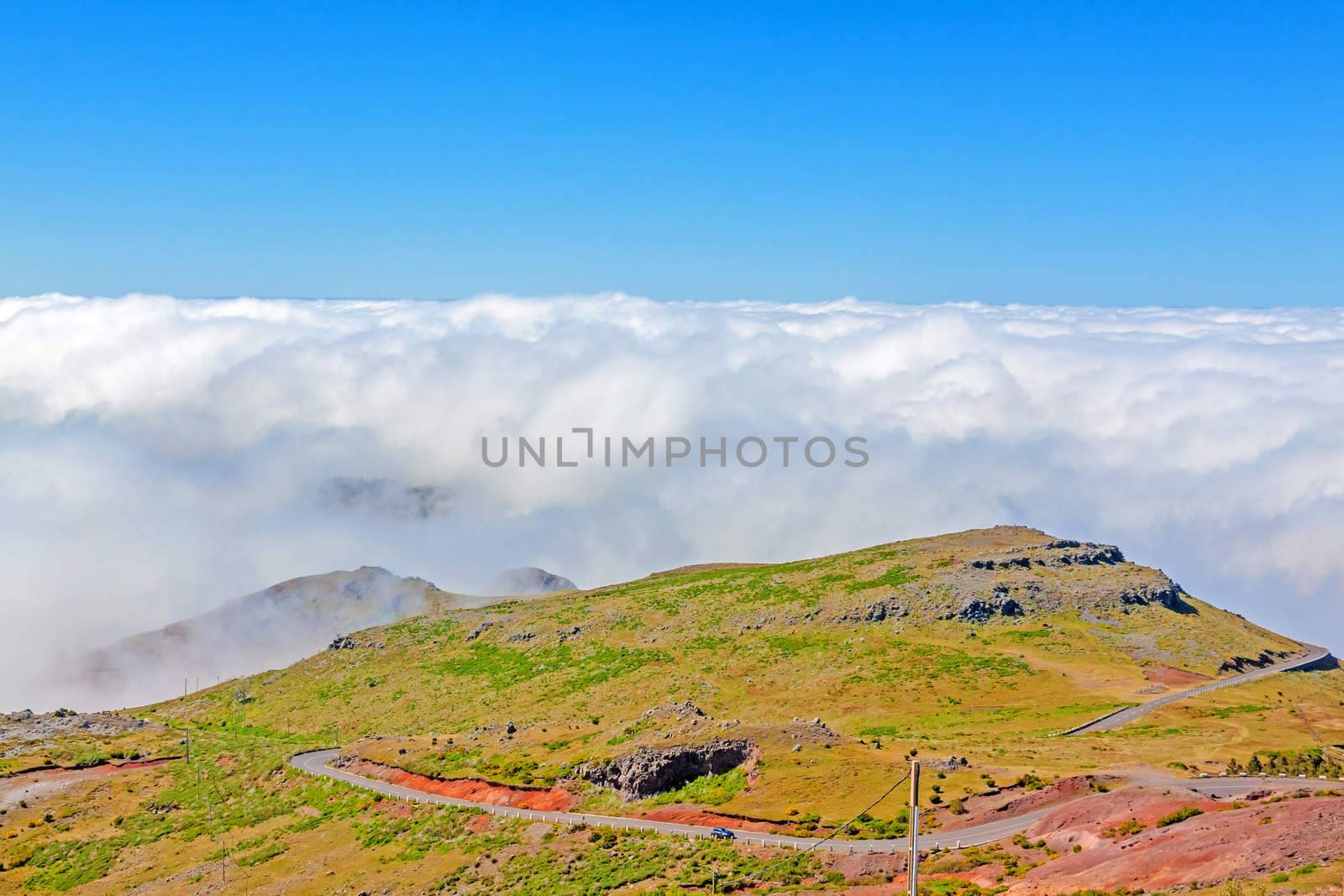 In the heart of Madeira near mountain Pico Ruivo - view over the cloud ceiling, blue sky