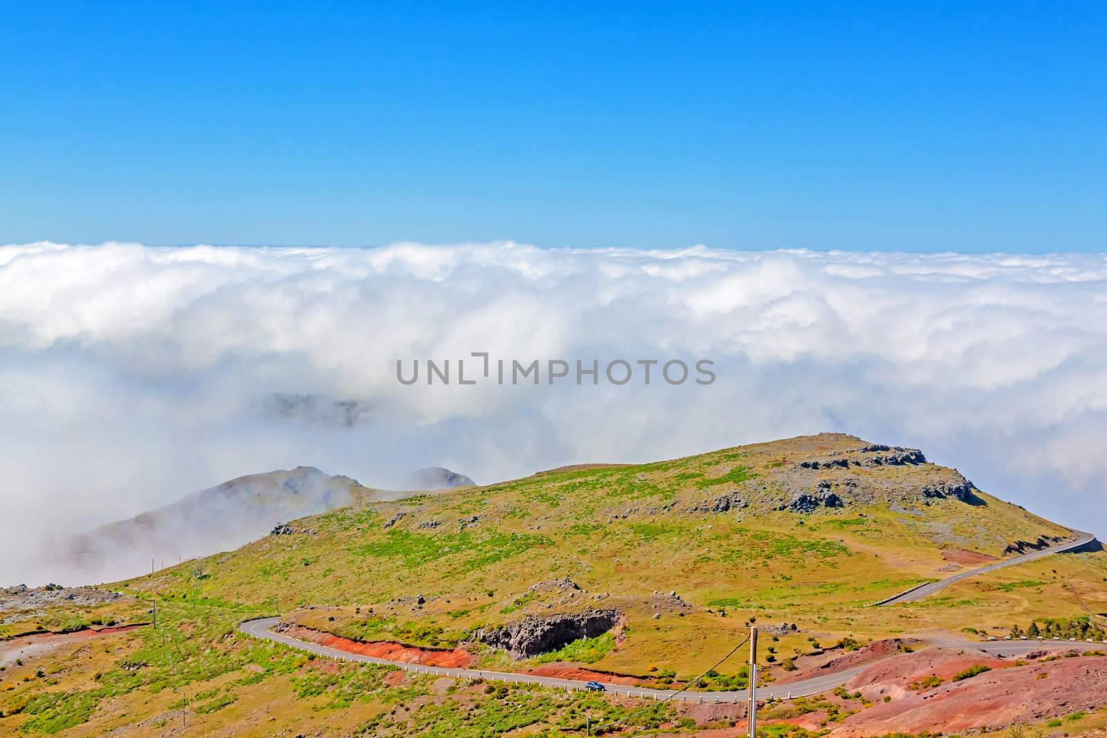 In the heart of Madeira near mountain Pico Ruivo - view over the cloud ceiling, blue sky