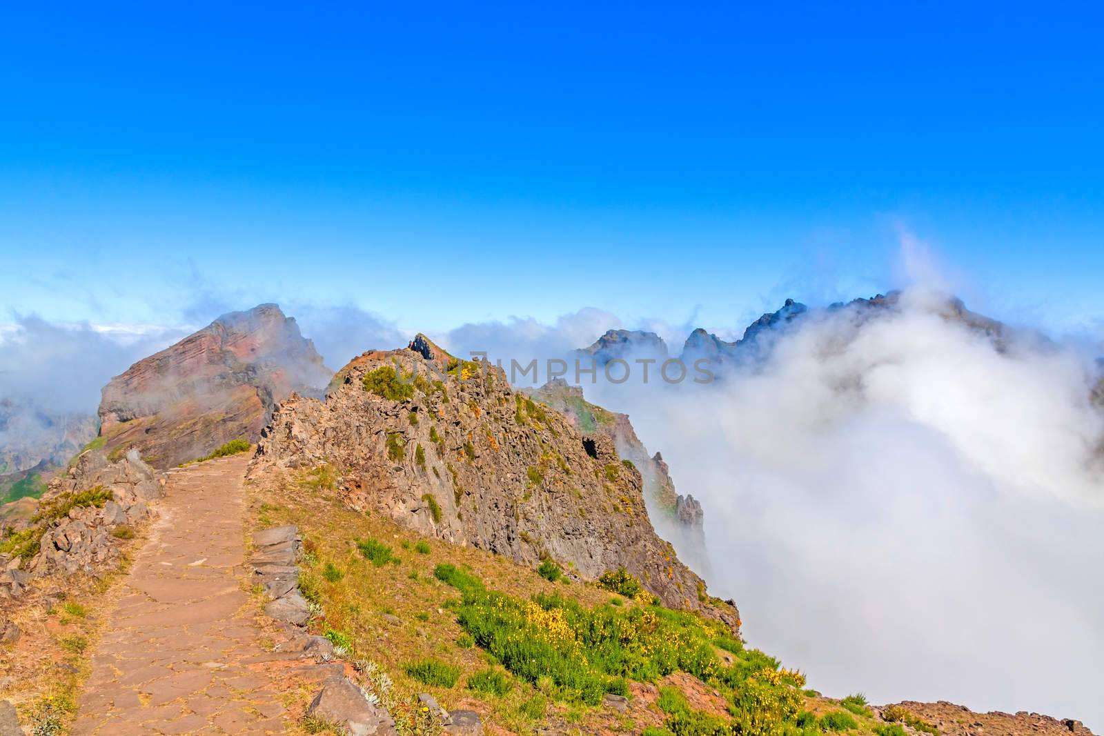 Colorful volcanic mountain landscape - hiking path from Pico do Arieiro to Pico Ruivo, Madeira, Portugal