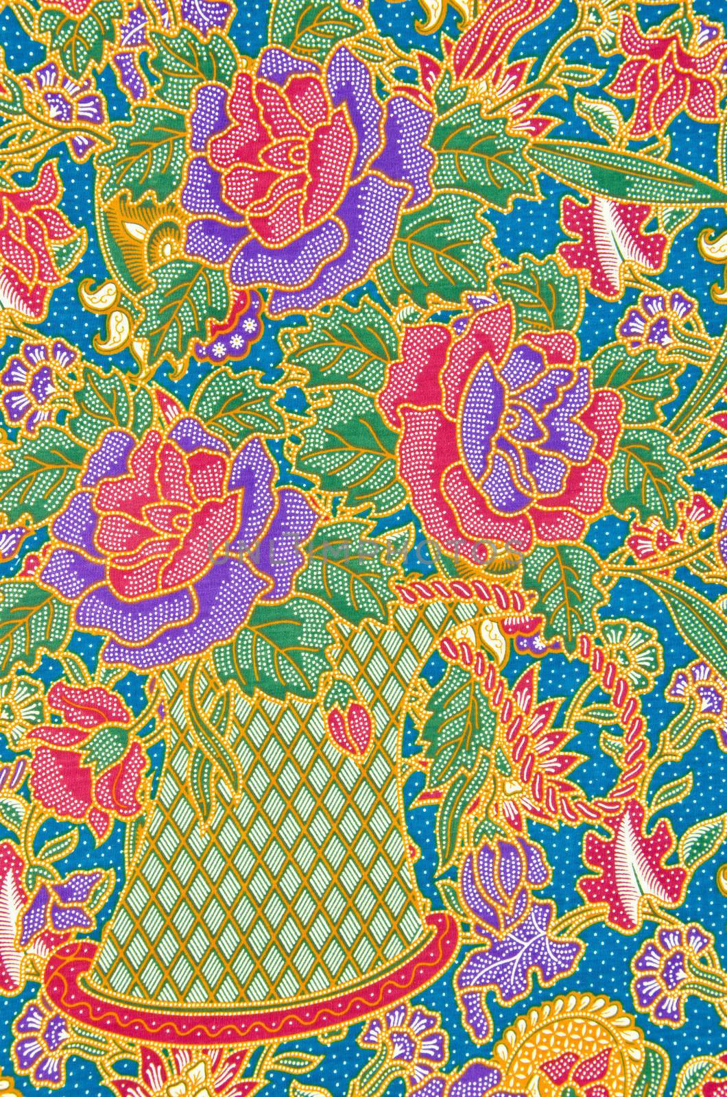 Traditional batik sarong pattern background by Gamjai