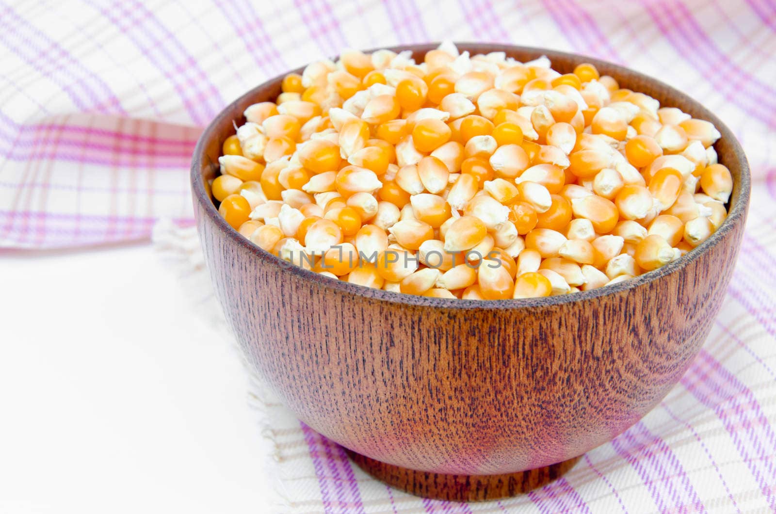 raw corn seed in bowl wooden.