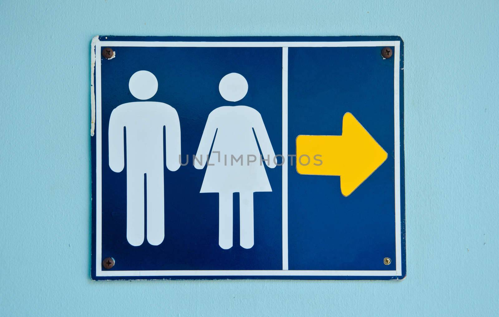 The public rest room old sign on wall.