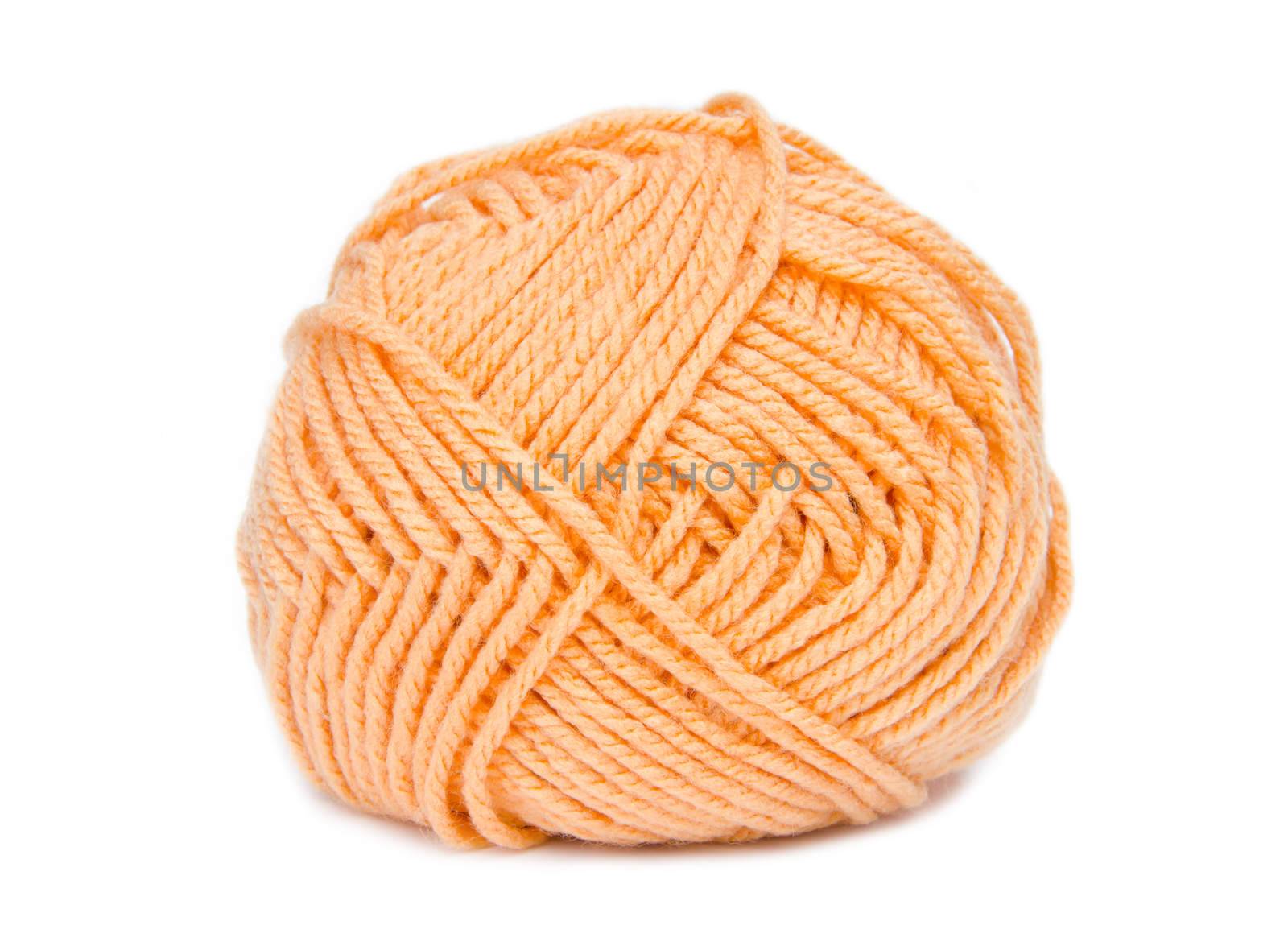 orange yarn on white background.