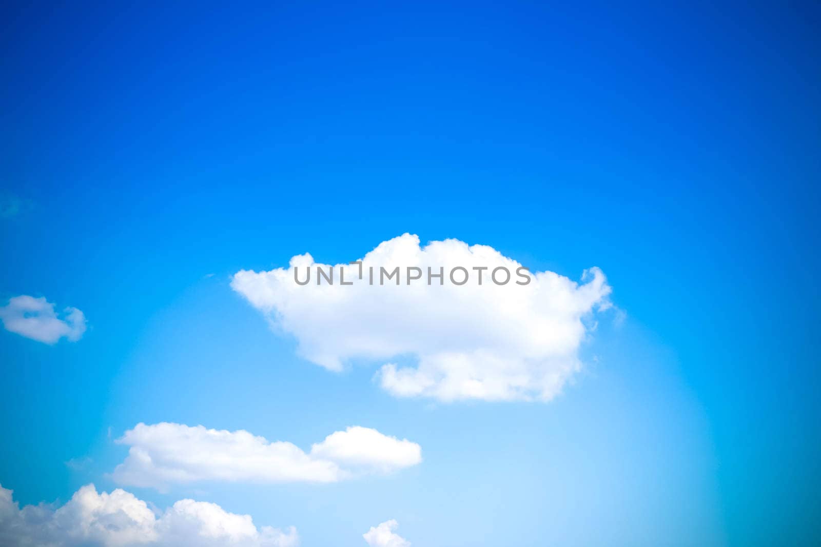 Cloudy blue sky abstract background by teerawit