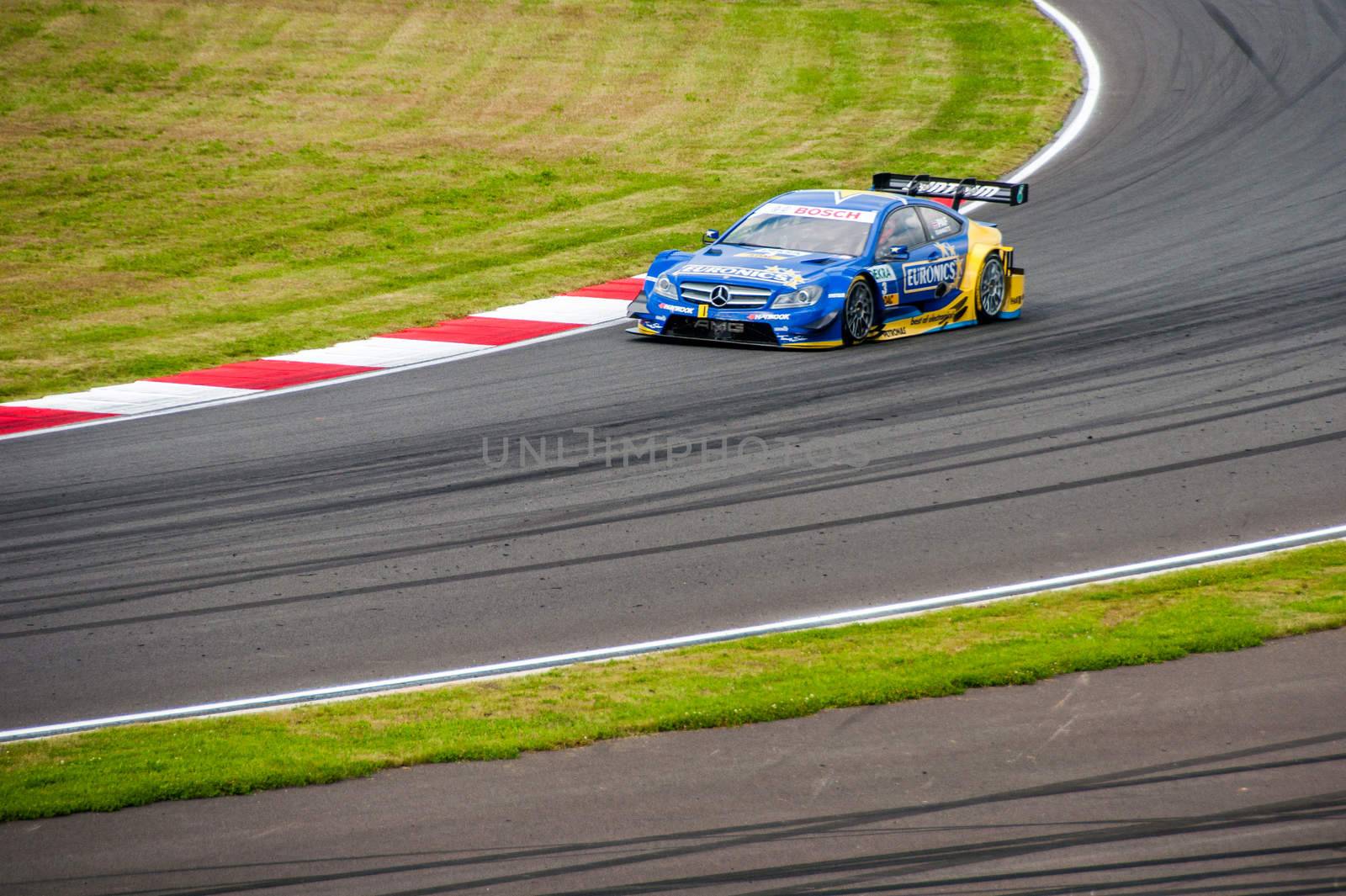 Gary Paffett and him Mercedes AMG at DTM (Deutsche Tourenwagen Meisterschaft) on MRW (Moscow RaceWay), Moscow, Russia, 2013.08.04