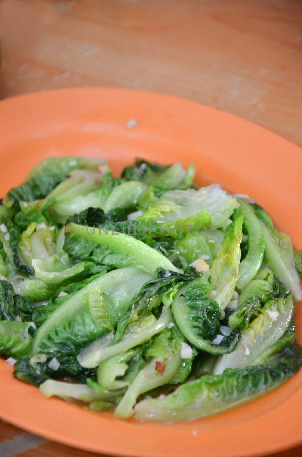 Chinese style fried lettuce served in restaurant