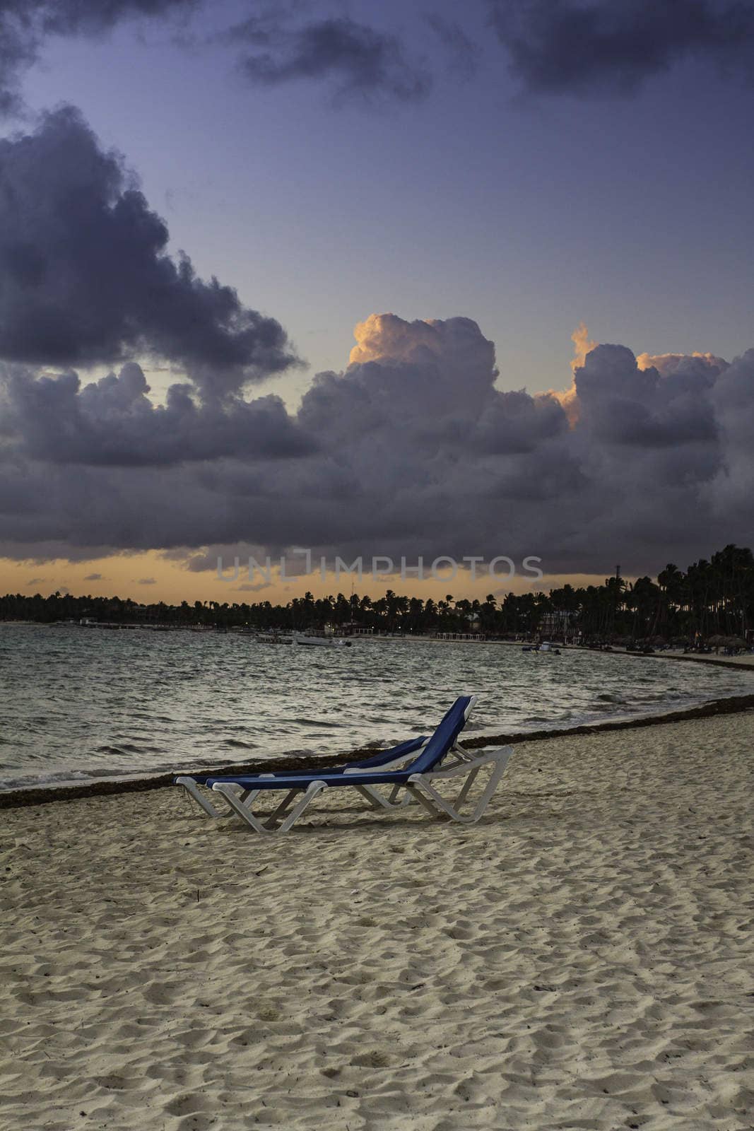 two resort beach chair on the beach at sunrise