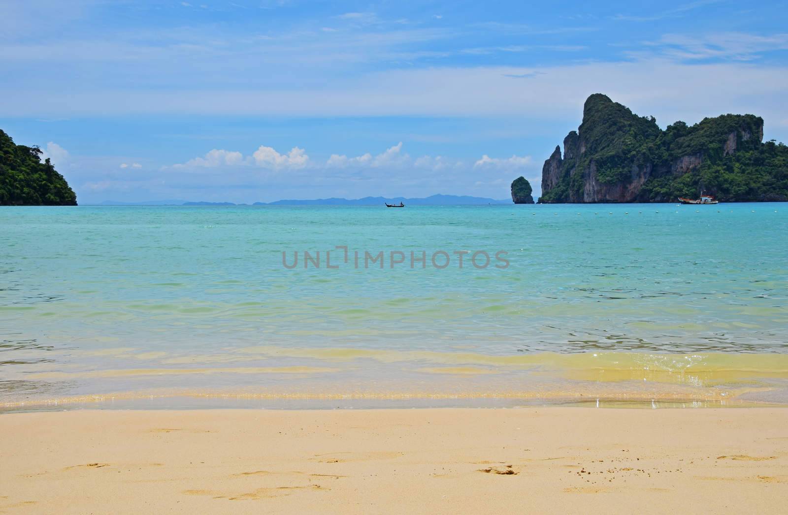 Paradise tropical sand sea beach with rock by BreakingTheWalls