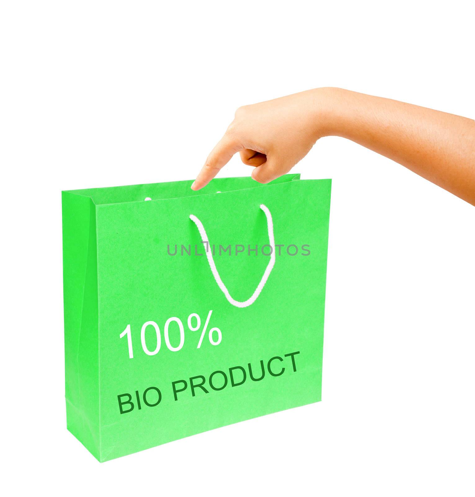 hand and blank green paper bag isolated on white background. 100% bio product